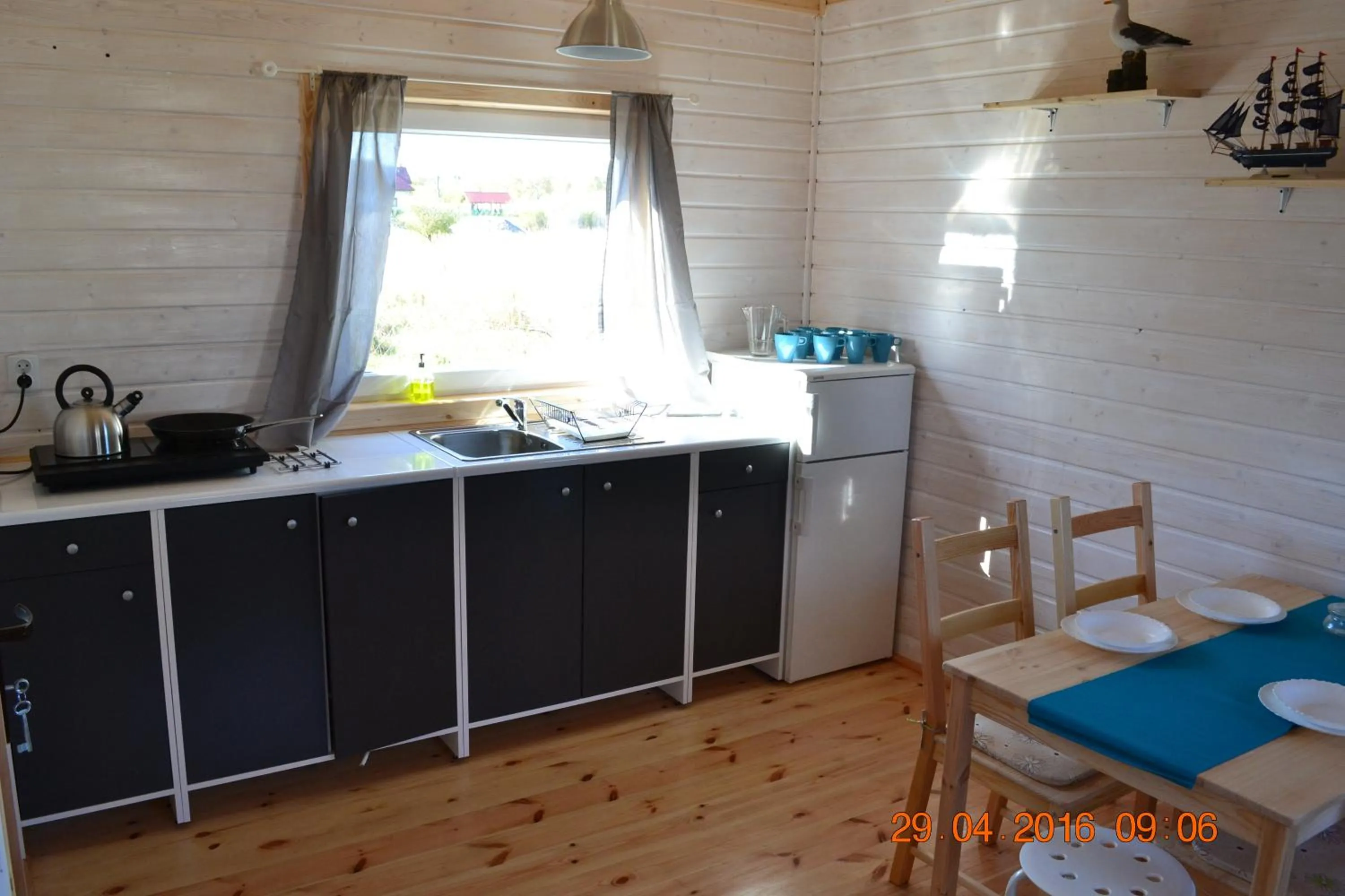 Kitchen or kitchenette in Domki Letniskowe Skandynawia