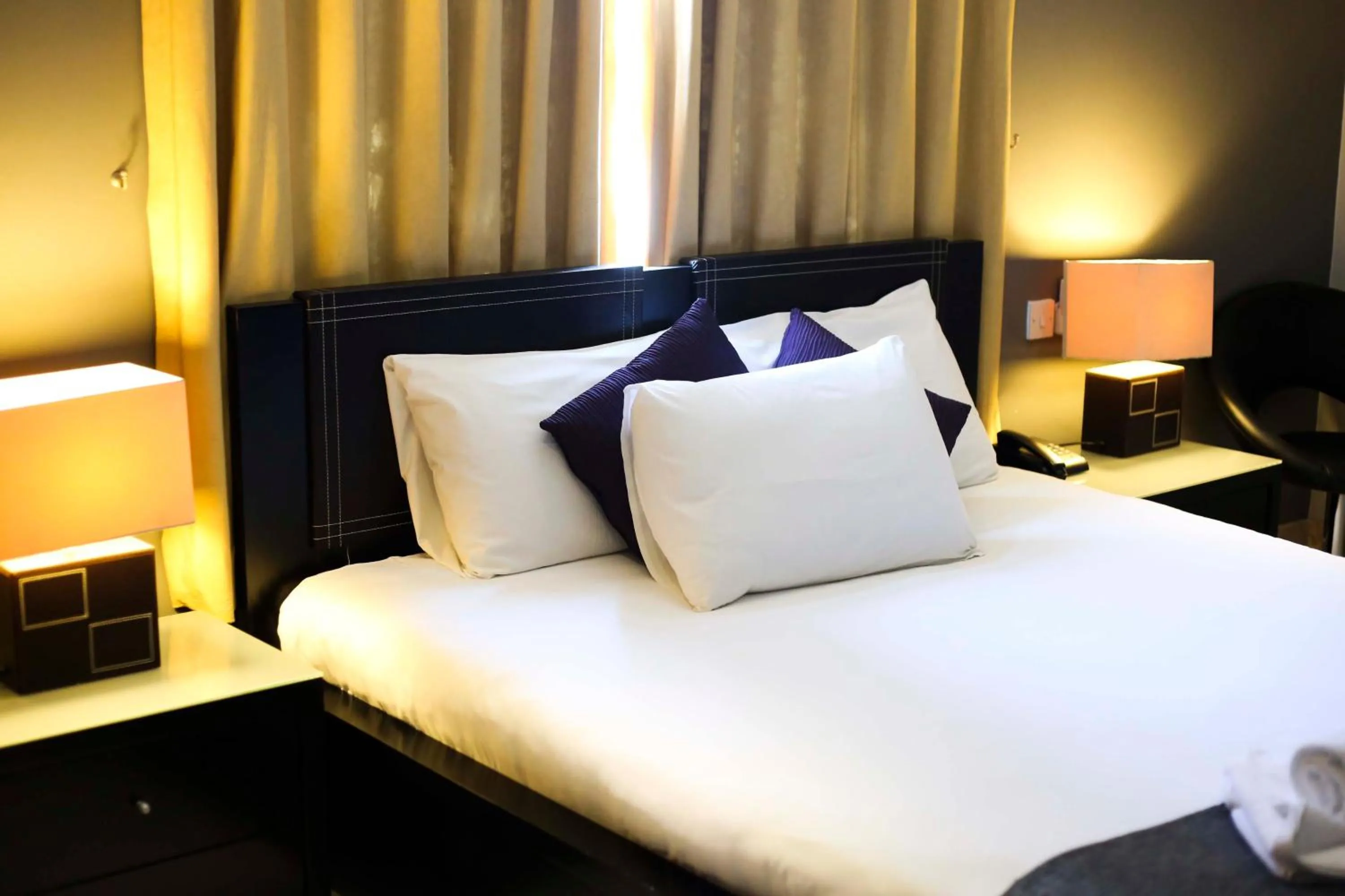 Bedroom in Pebbles Boutique Aparthotel