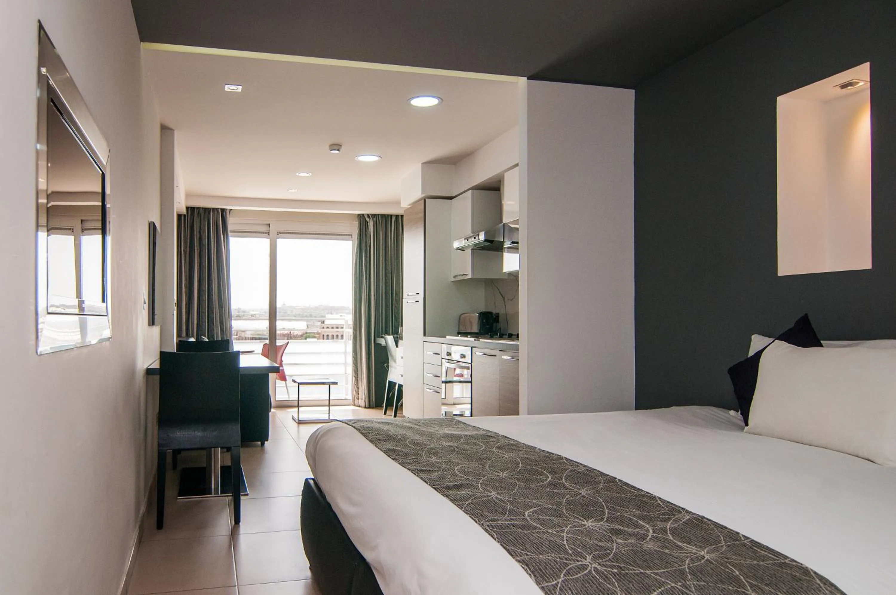 Bedroom in Pebbles Boutique Aparthotel