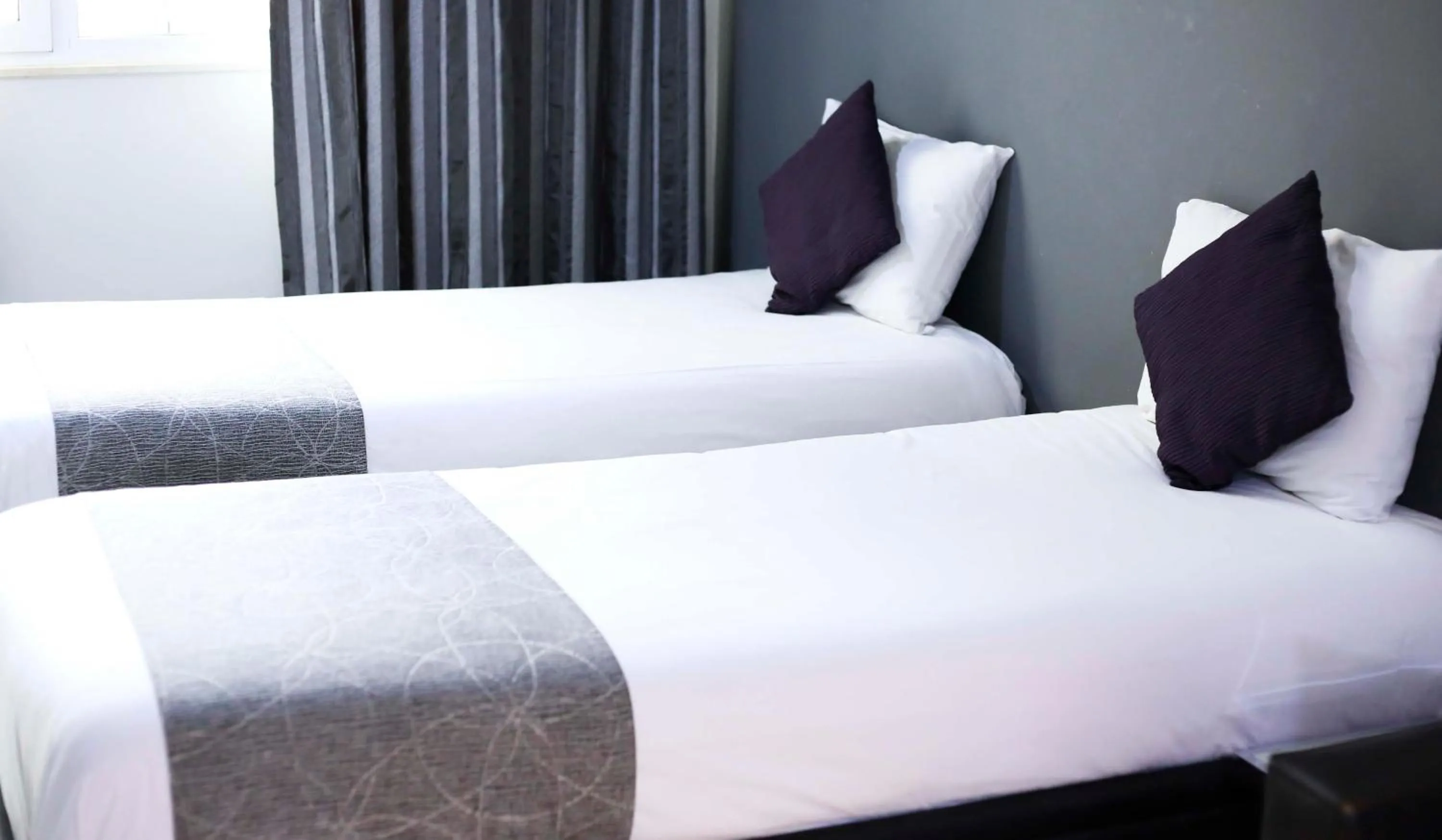 Bedroom in Pebbles Boutique Aparthotel