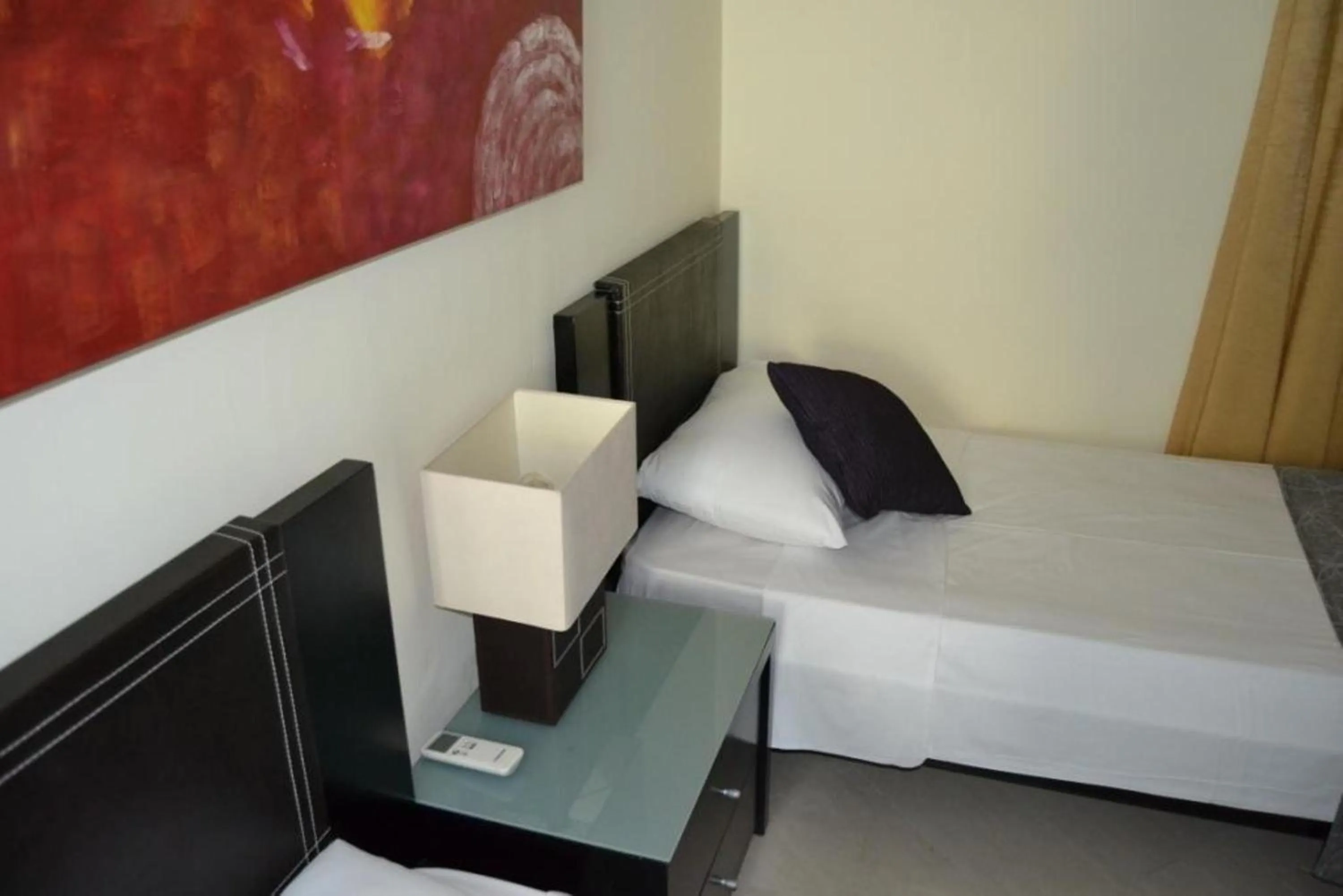 Bedroom, Seating Area in Pebbles Boutique Aparthotel