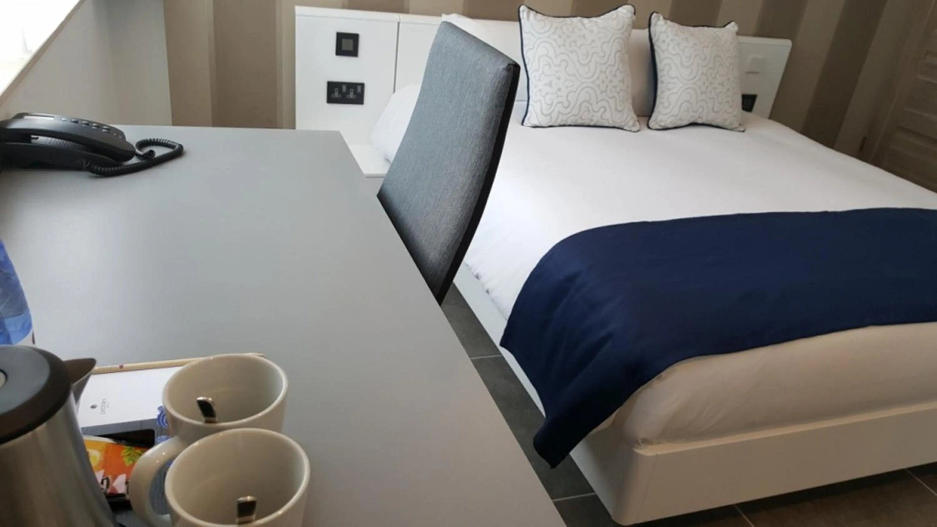 Bedroom in Pebbles Boutique Aparthotel