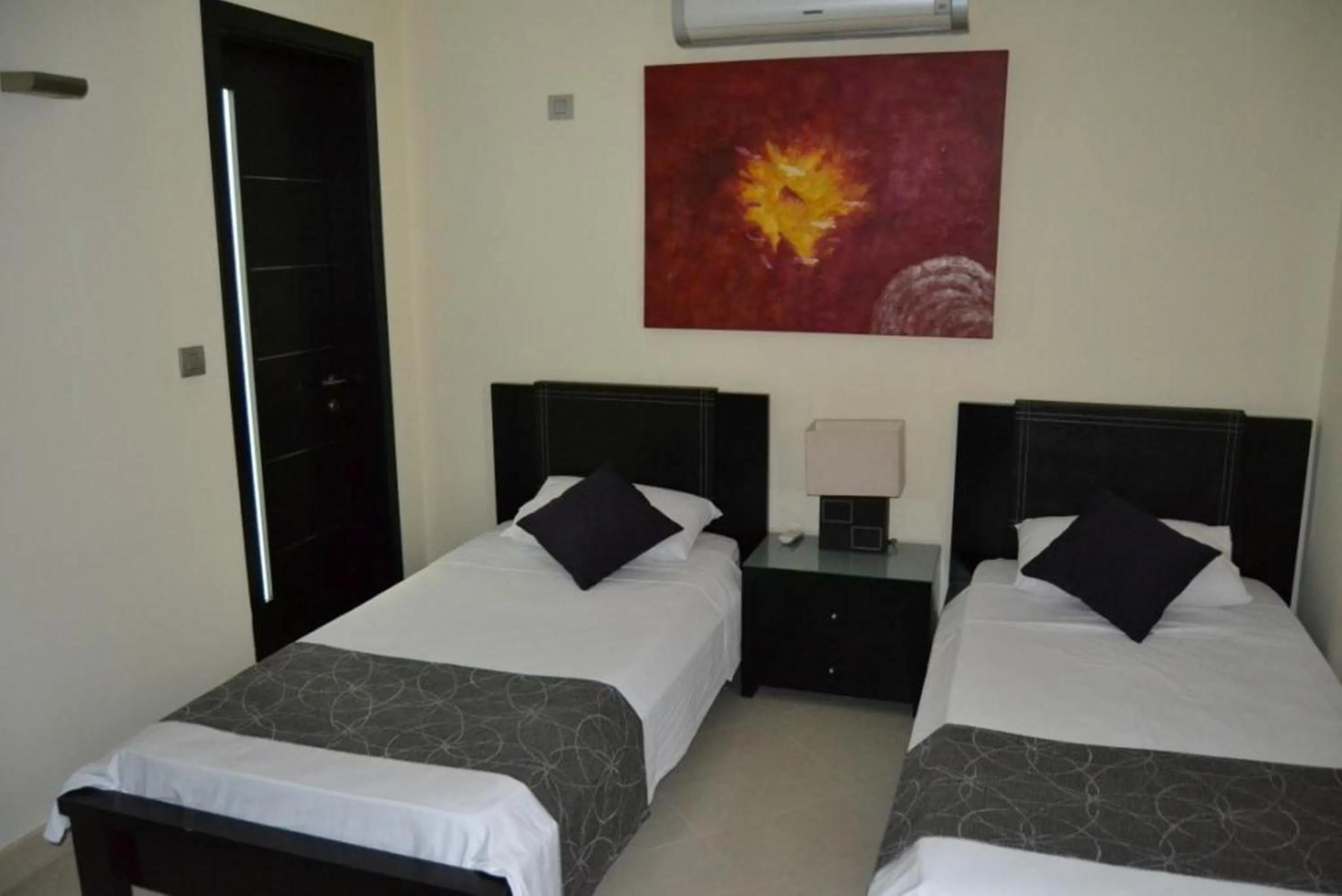 Bedroom in Pebbles Boutique Aparthotel