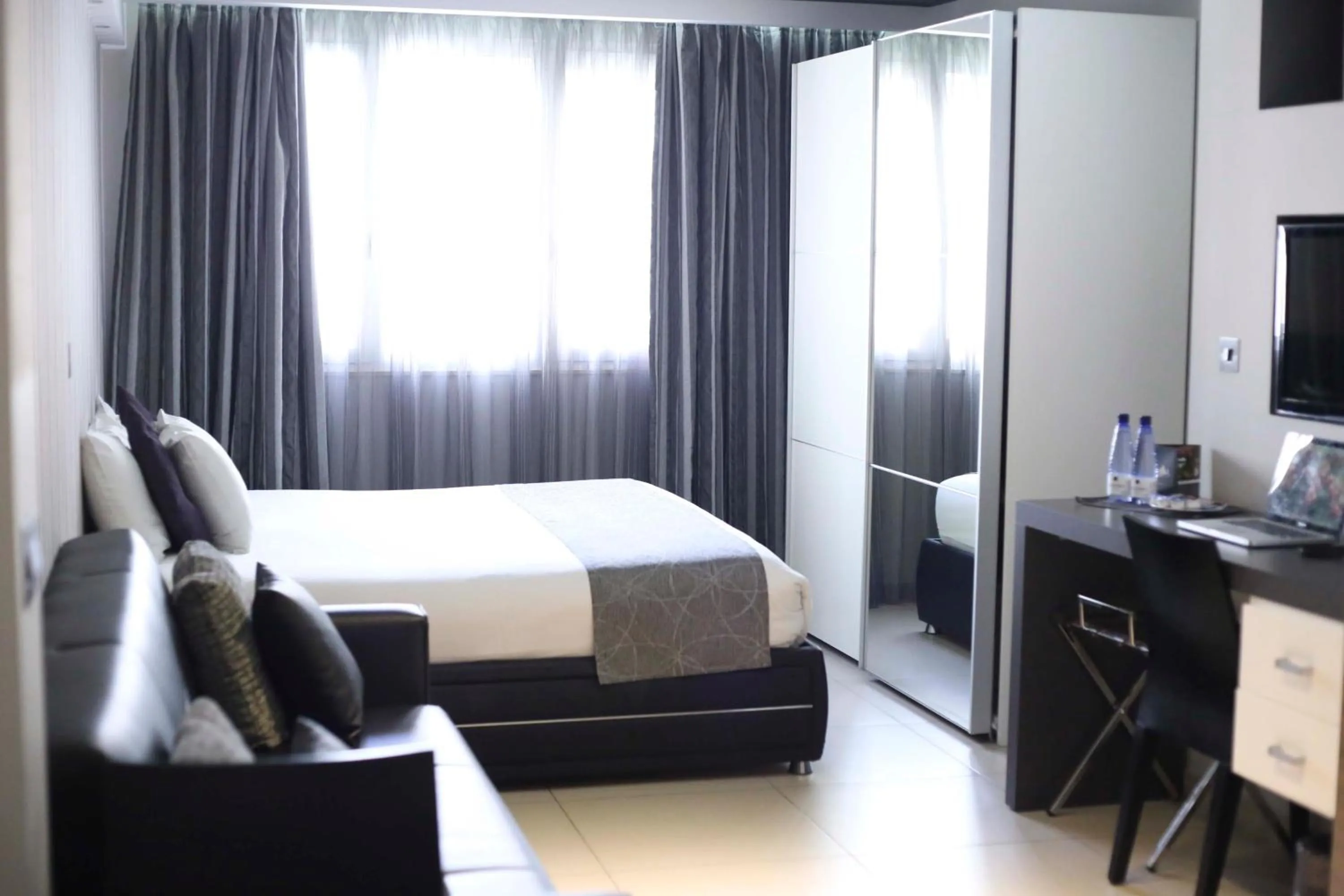 Bedroom in Pebbles Boutique Aparthotel