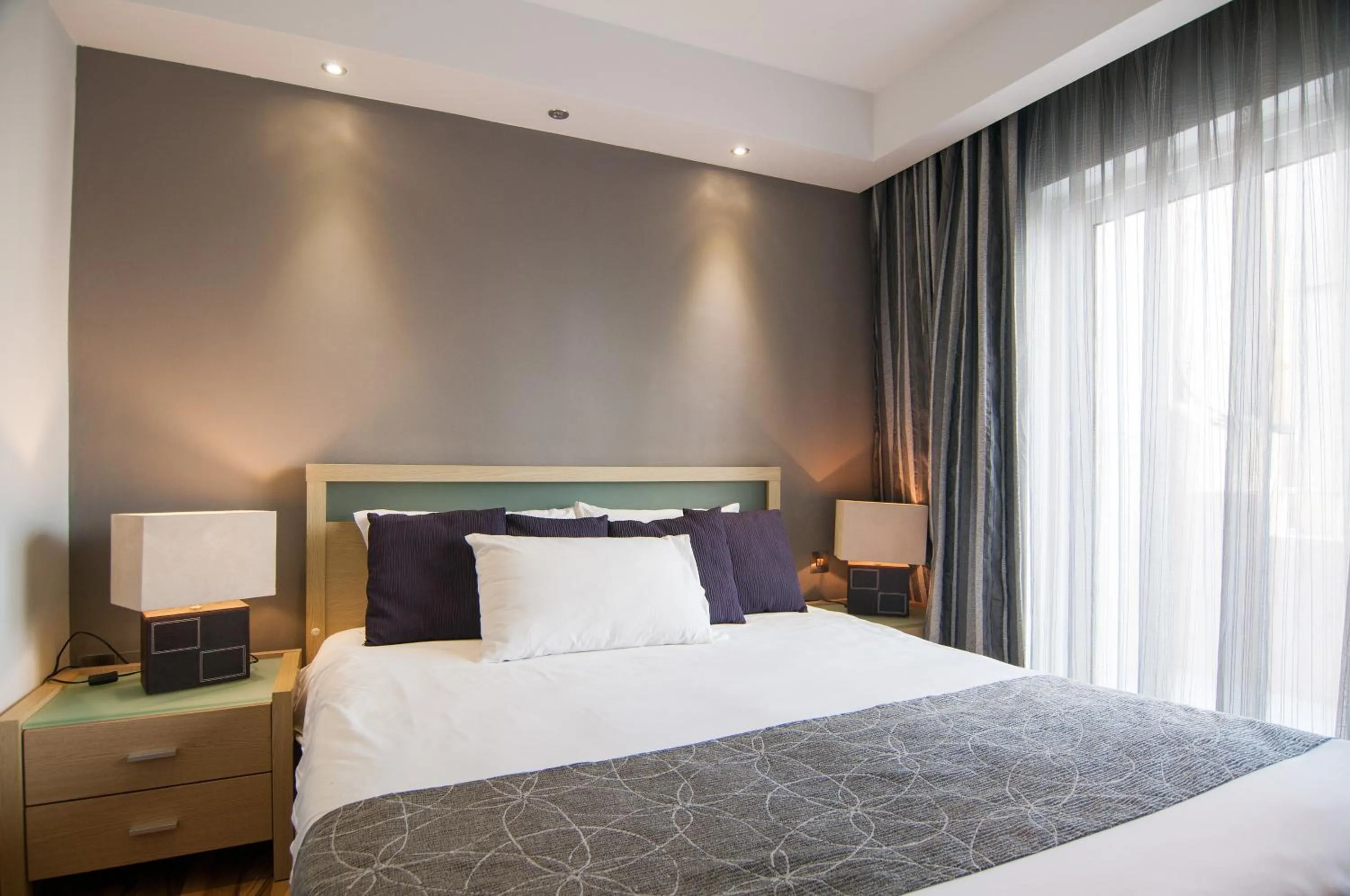 Bedroom in Pebbles Boutique Aparthotel