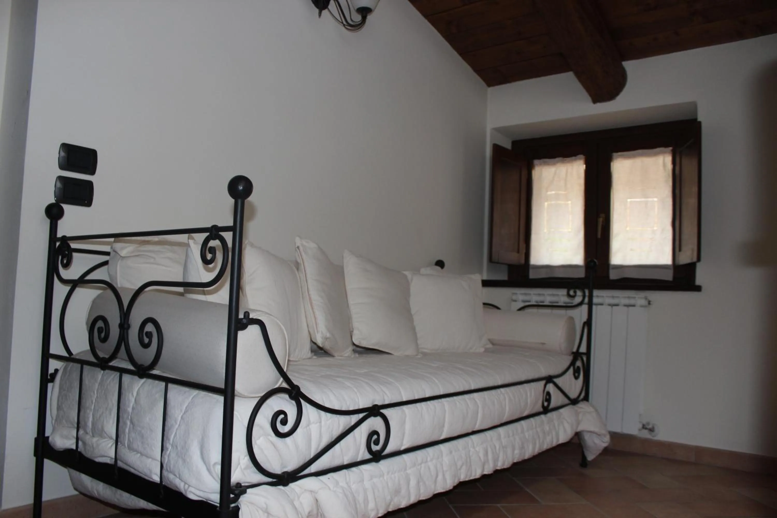 Living room, Bed in La Piazzetta