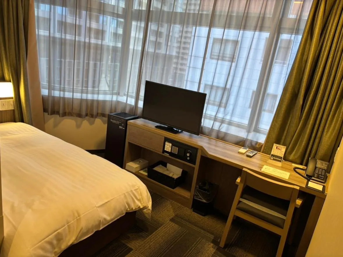 Bed in Dormy Inn Korakuen