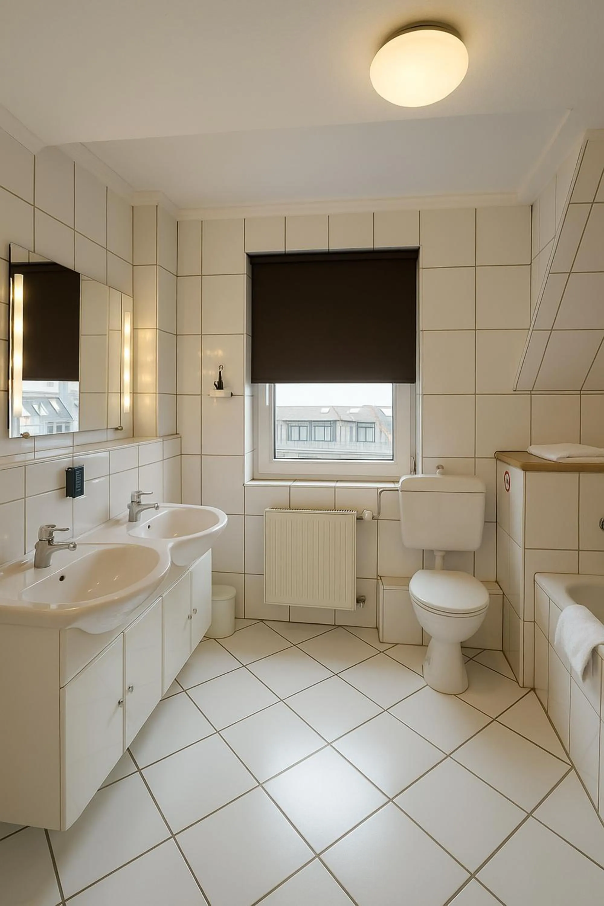 Bathroom in Apartments Atomis Hotel Düsseldorf City