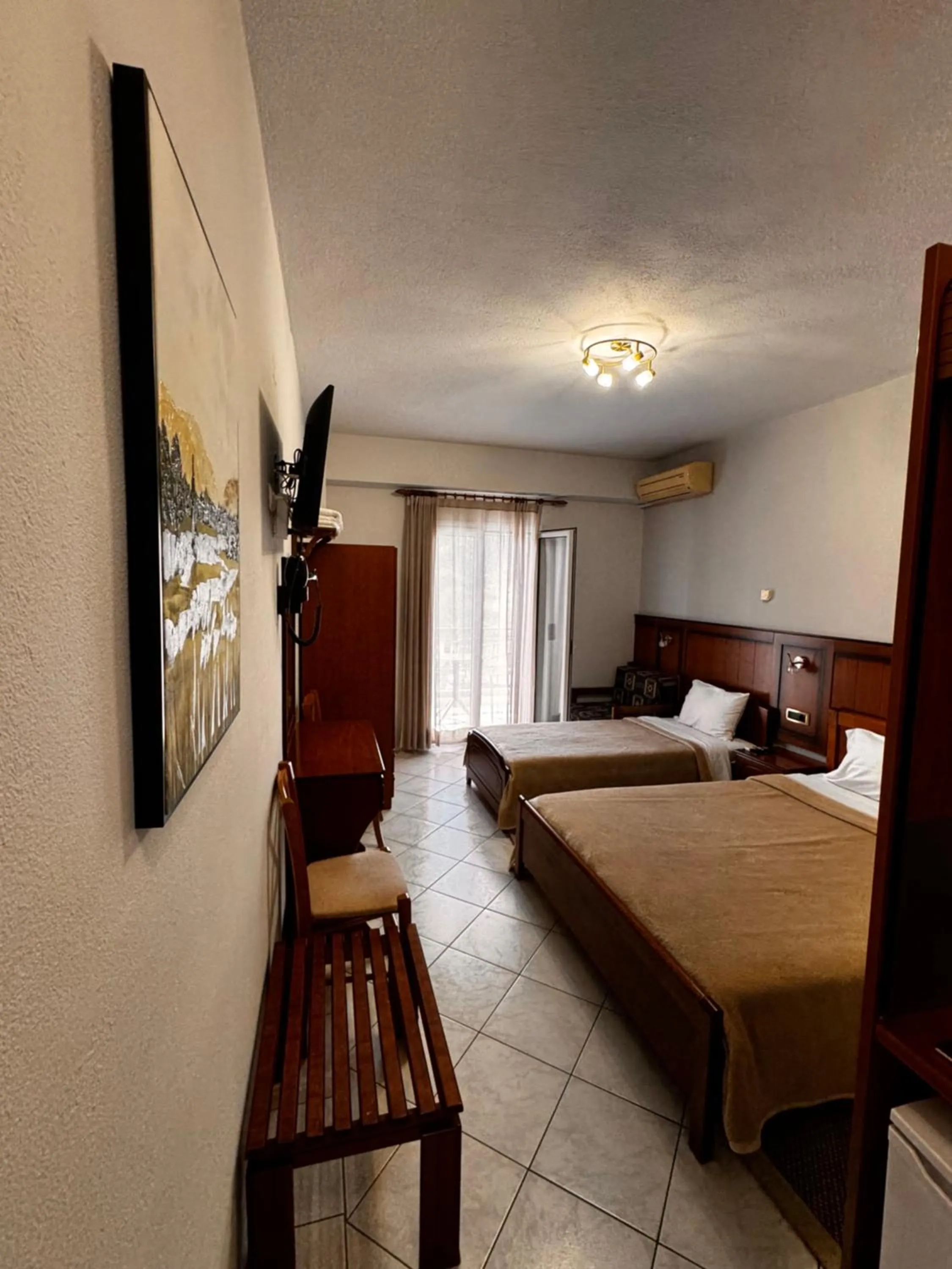 Bed in Paradosi Rooms