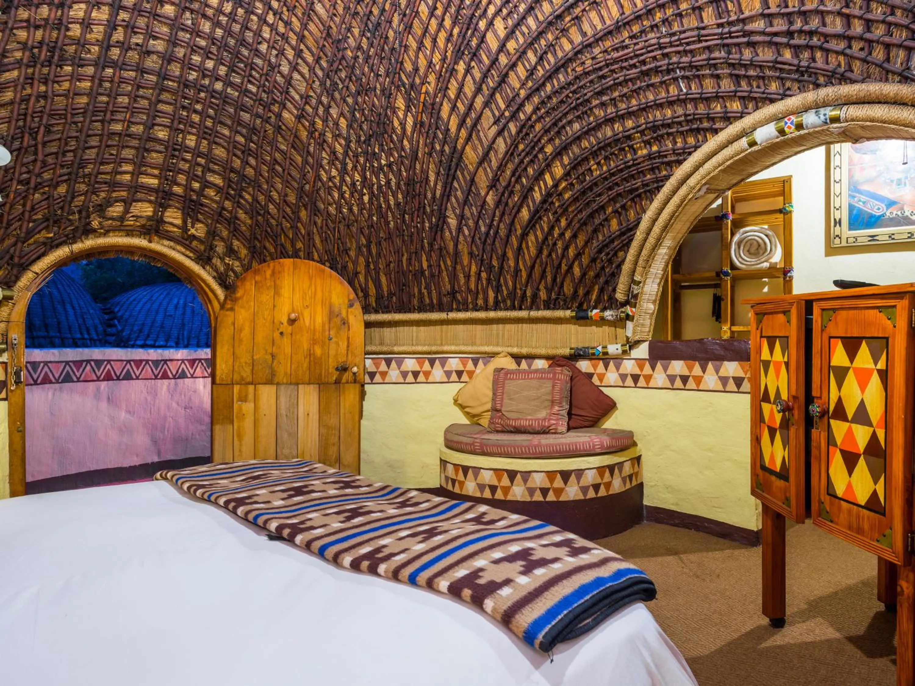 View (from property/room), Bed in aha Lesedi African Lodge & Cultural Village