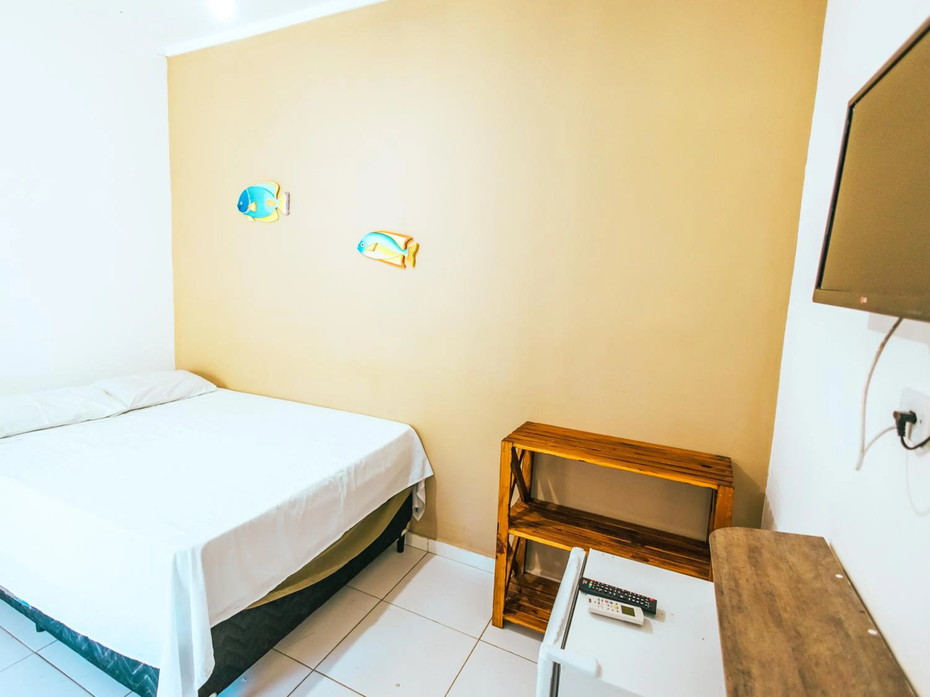 Bed in Pousada Sol Nascente