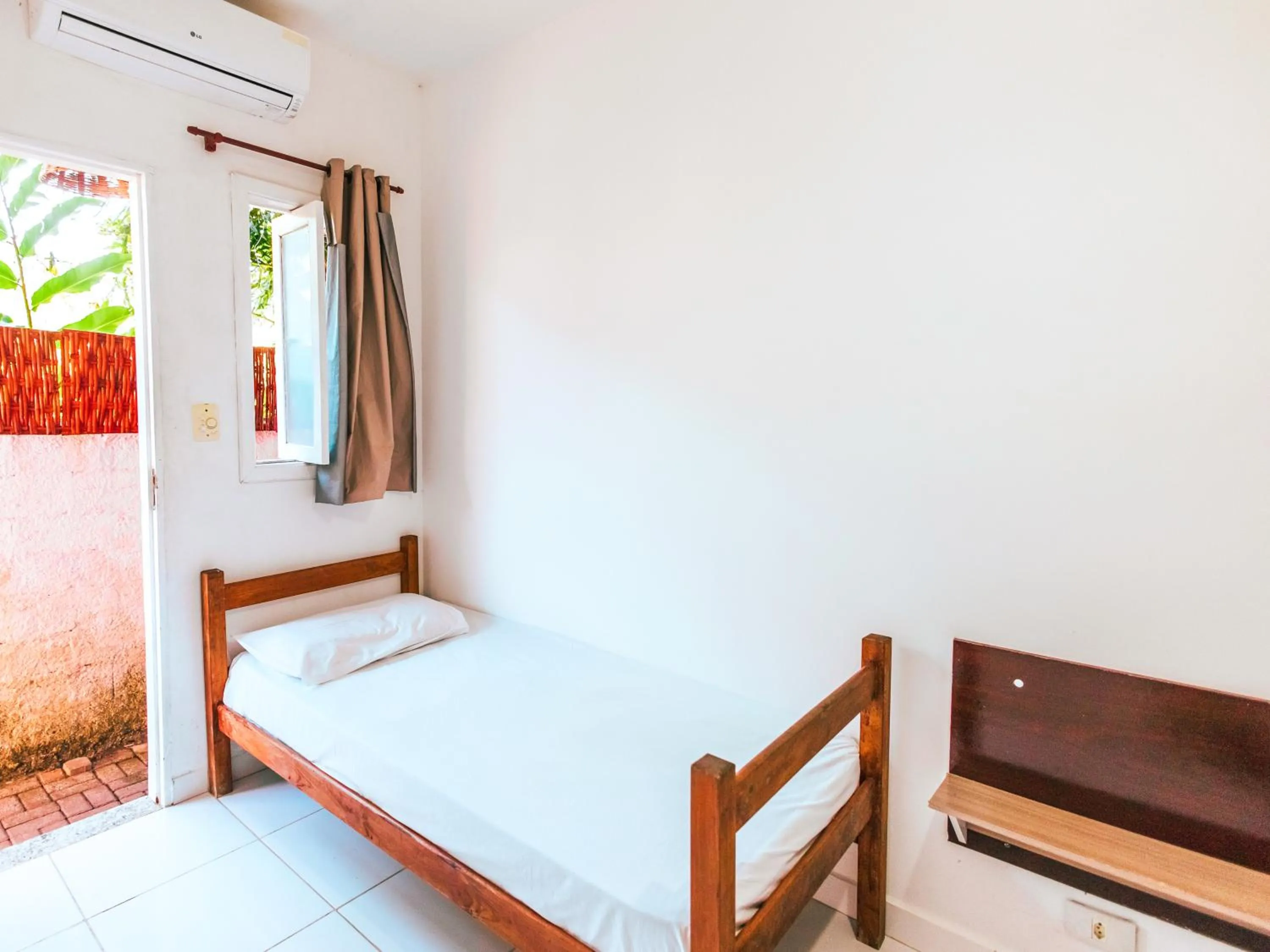 Bed in Pousada Sol Nascente