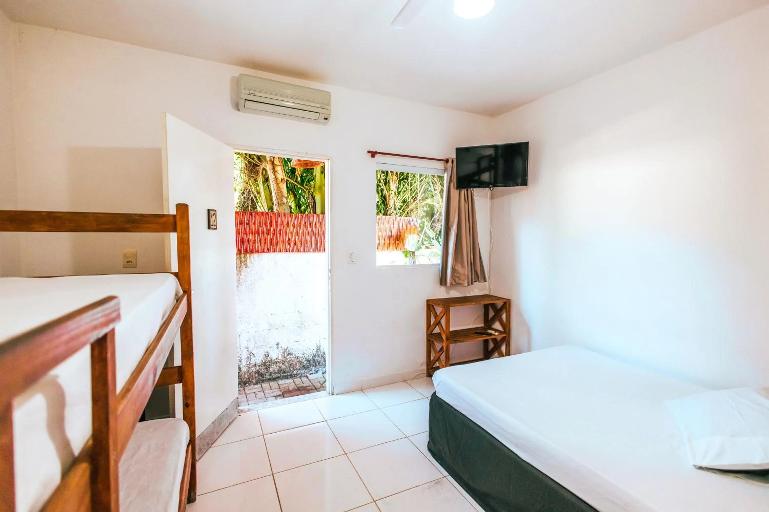 Bed in Pousada Sol Nascente