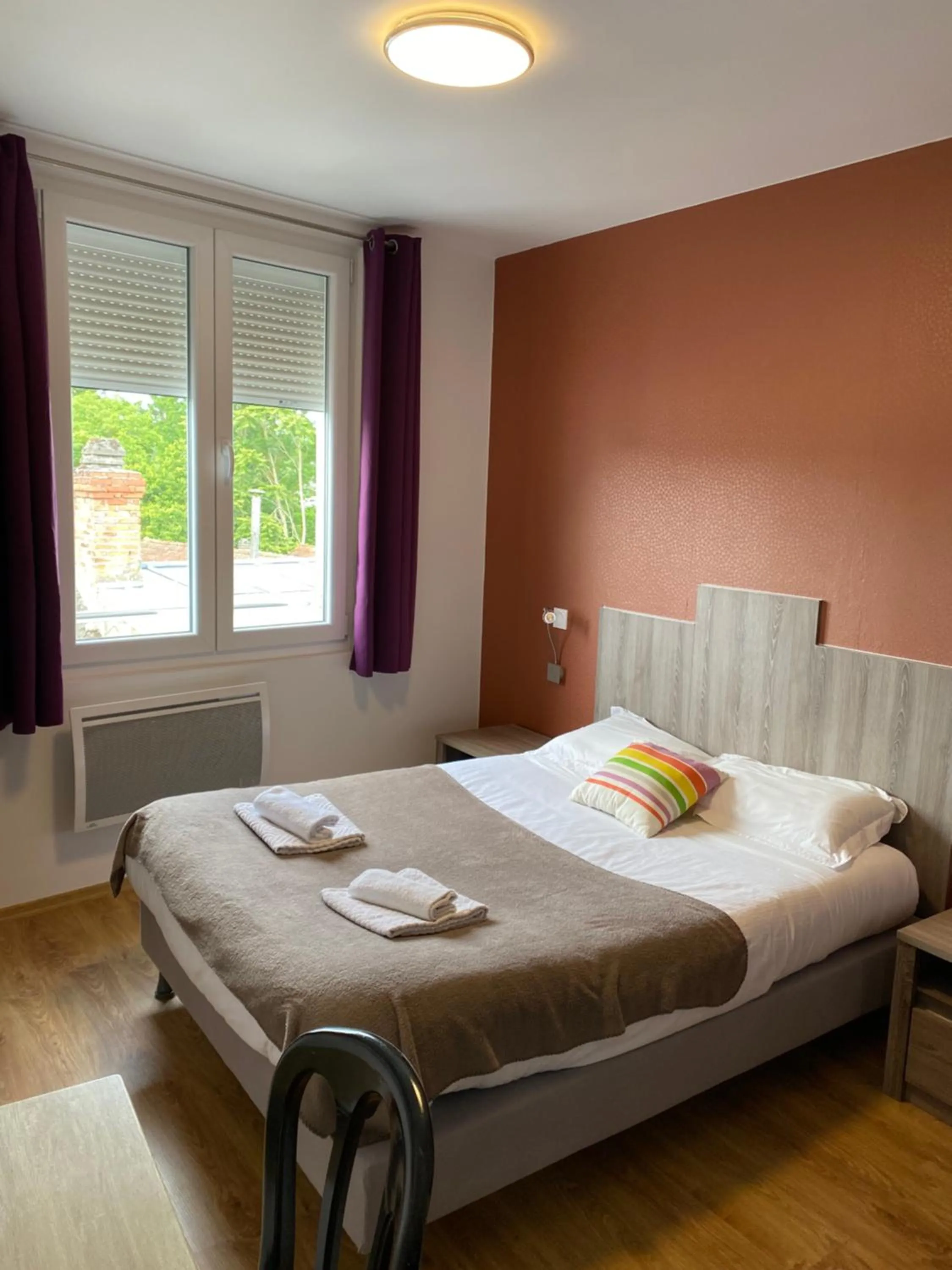 Bed in Hôtel Le Saint Amand