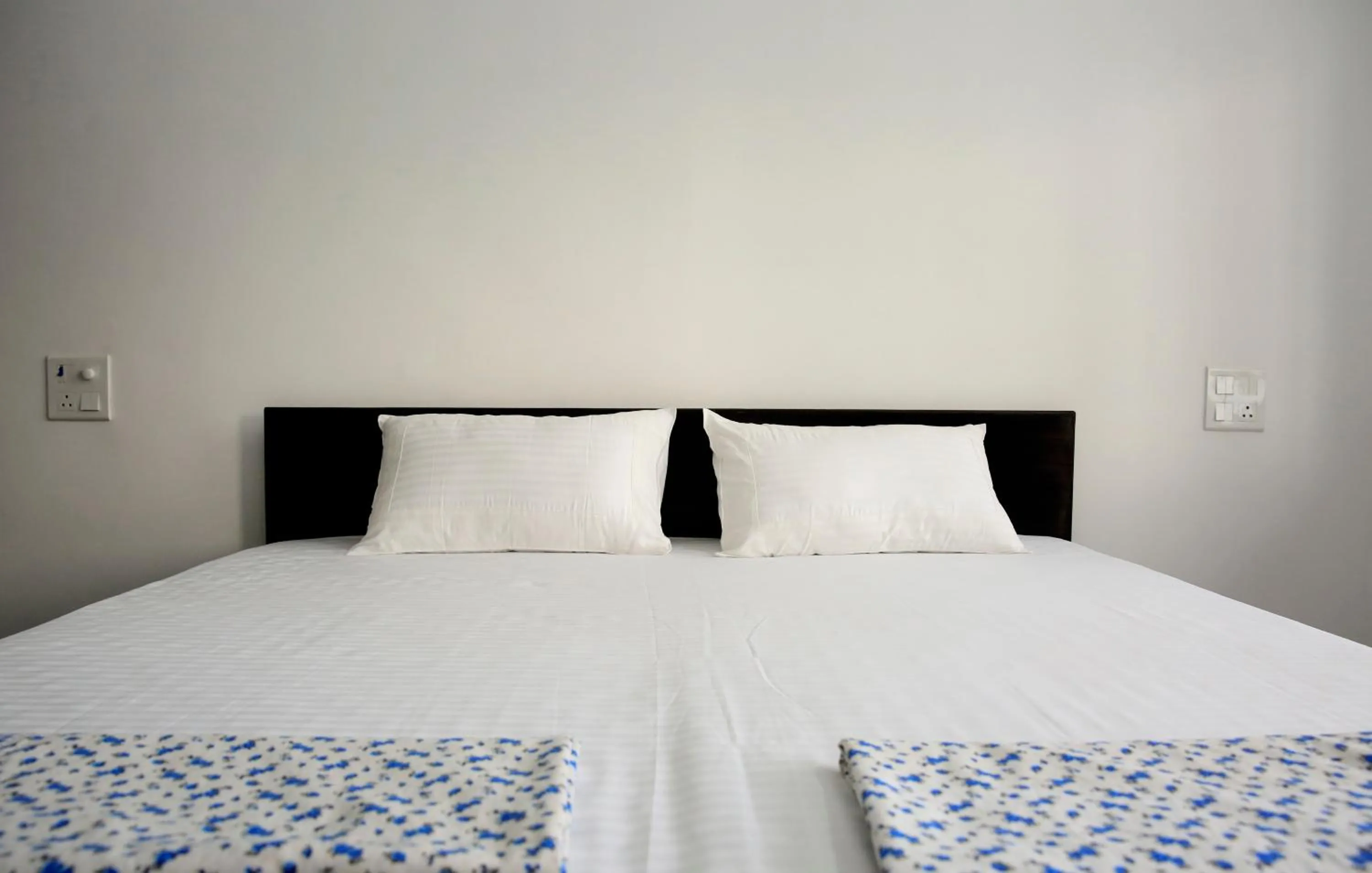 Bed in Sanidhya Inn