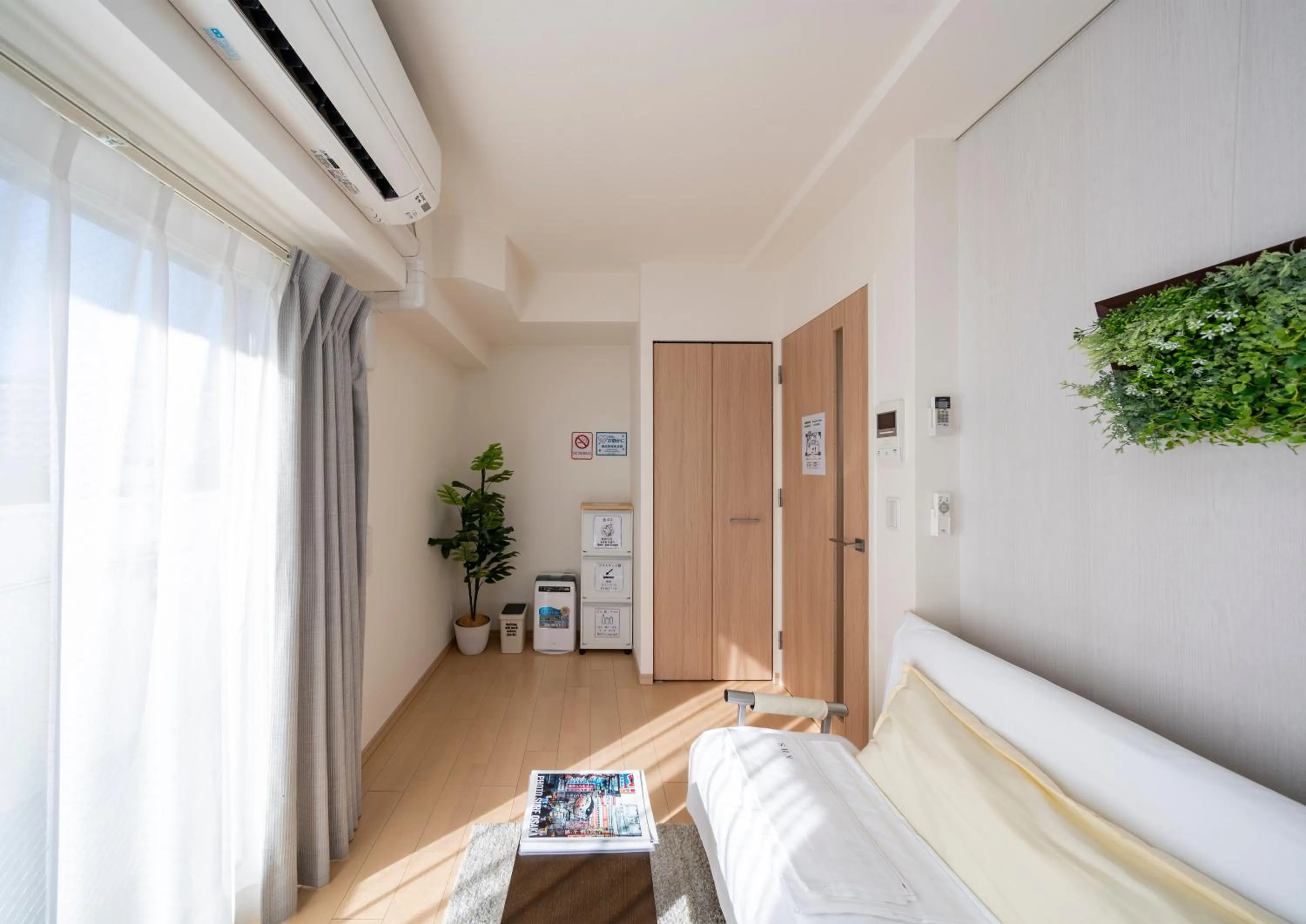 Living room, Bed in Meet Me Umeda Nishi