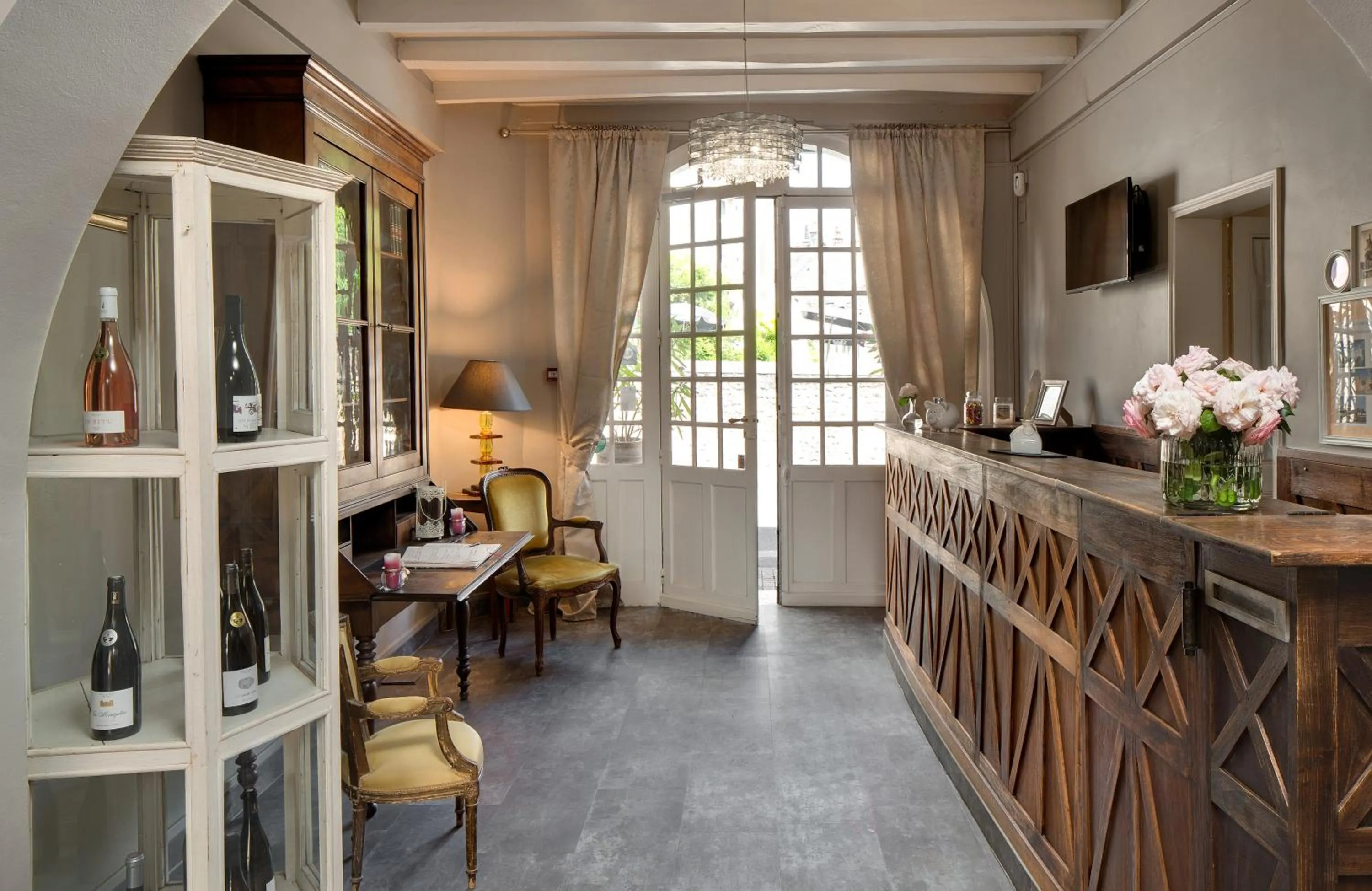 Lobby or reception in Hotel La Roseraie