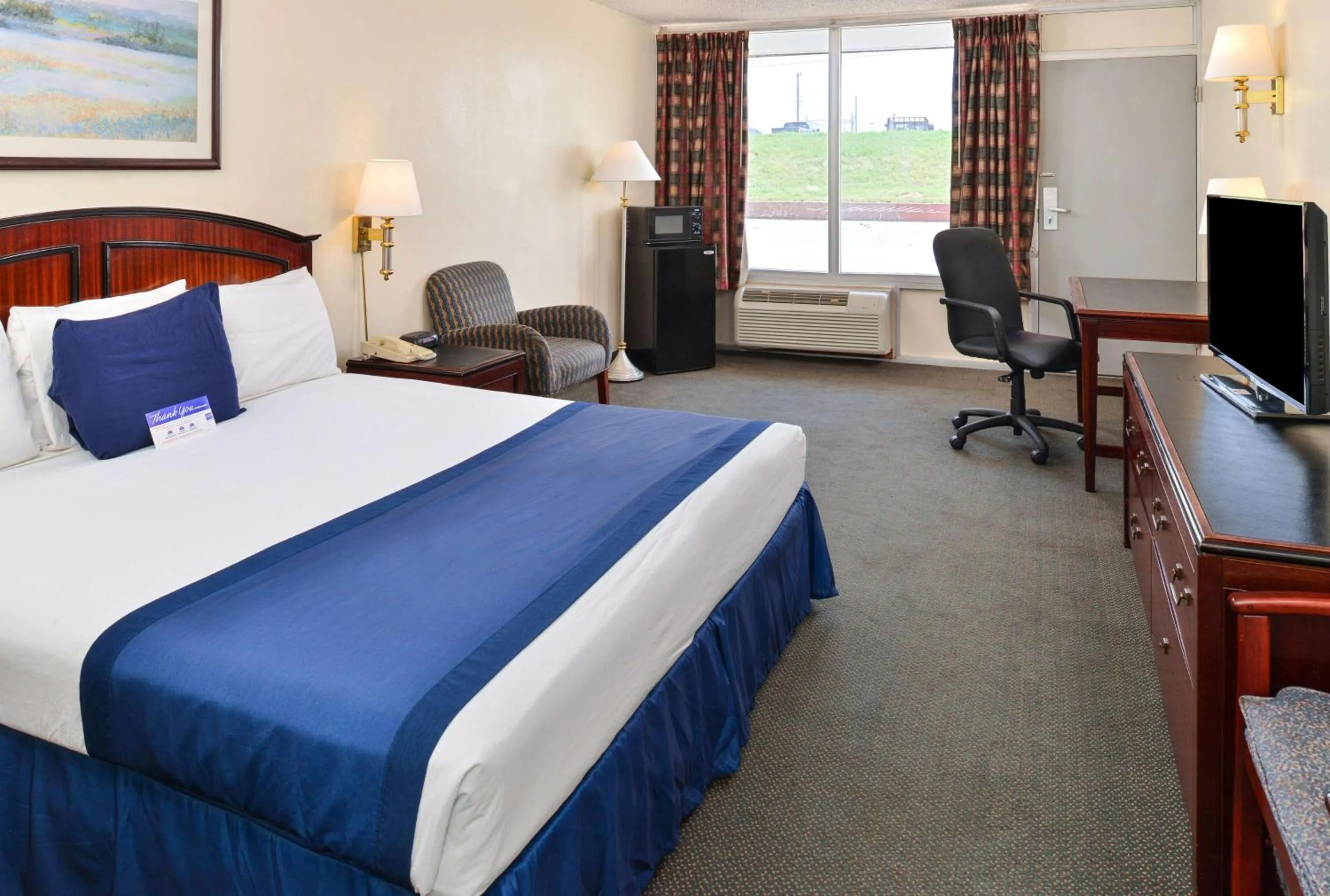 Bed in Castle Inn & Suites Anadarko