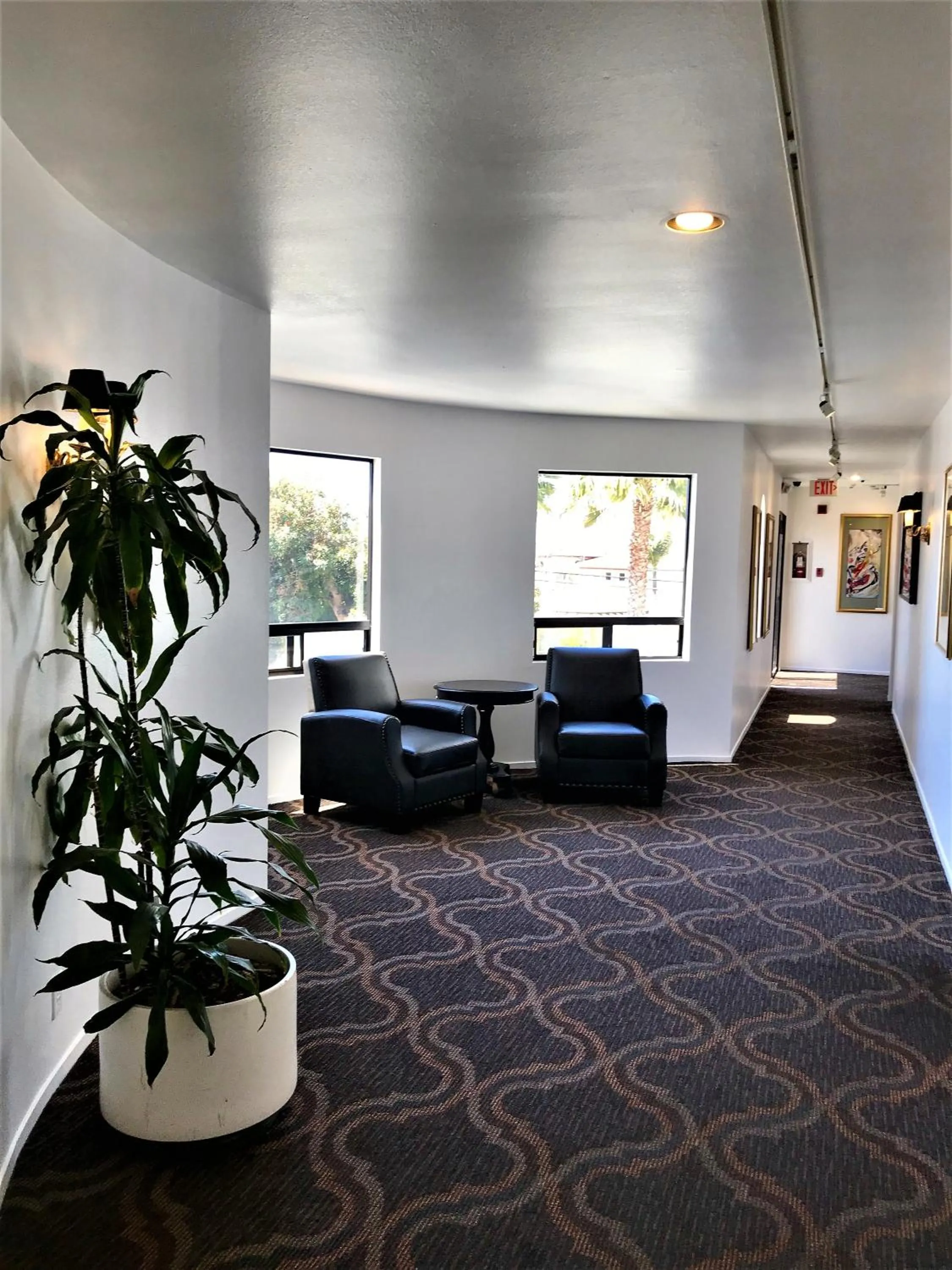 Seating area, Bed in Masterpiece Hotel