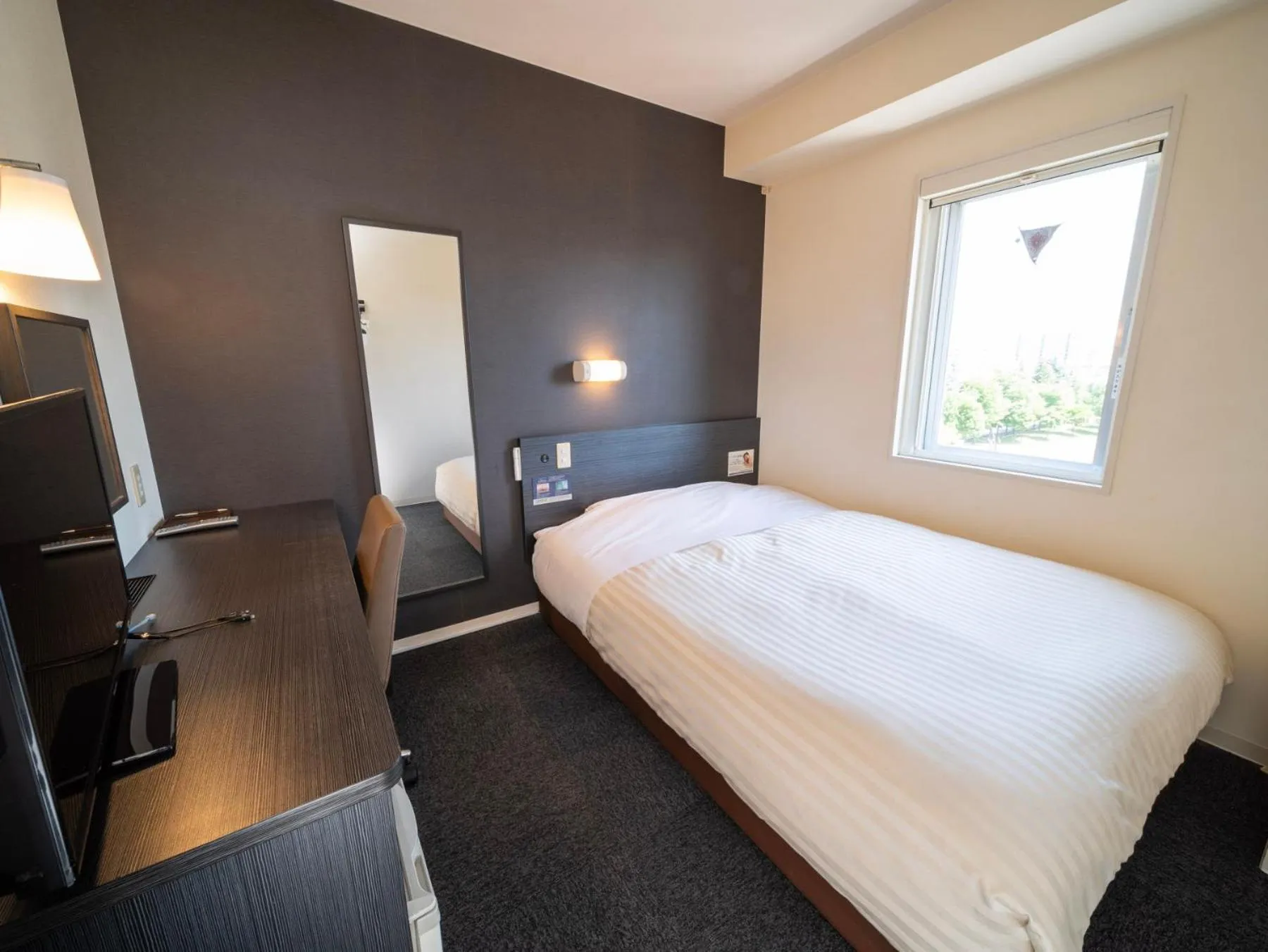 Photo of the whole room, Bed in Super Hotel Asahikawa