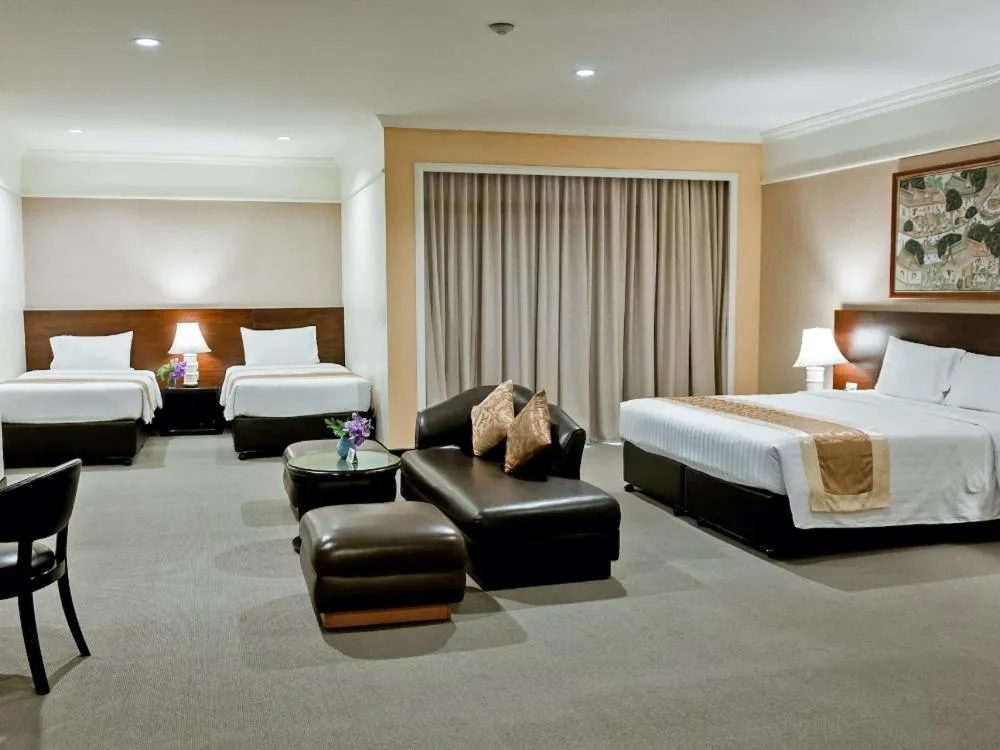 Bed in The Royal River Hotel