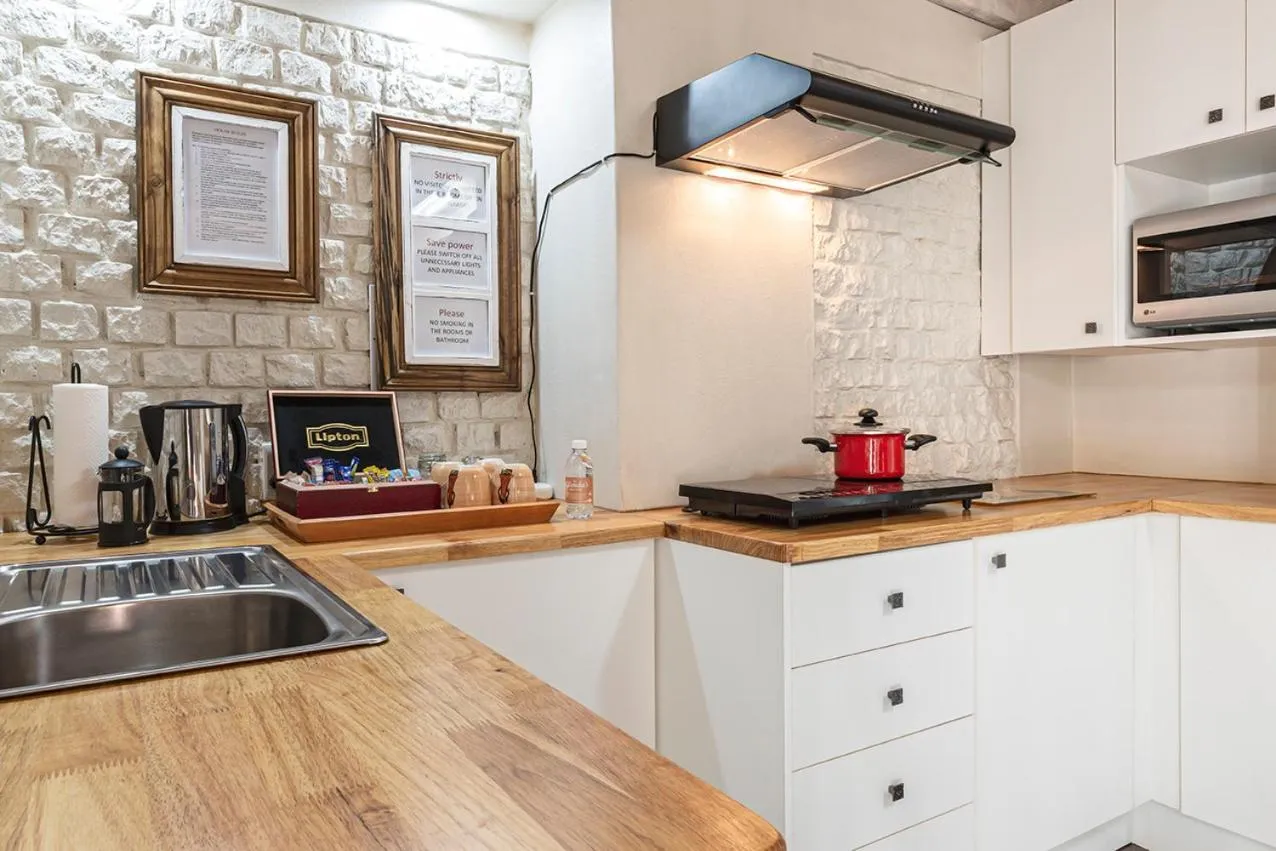 kitchen in Glenda's Guest Suites
