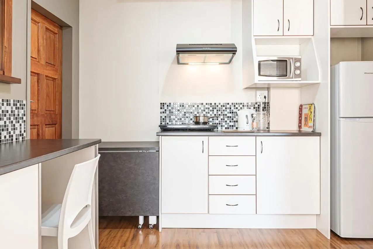 kitchen in Glenda's Guest Suites