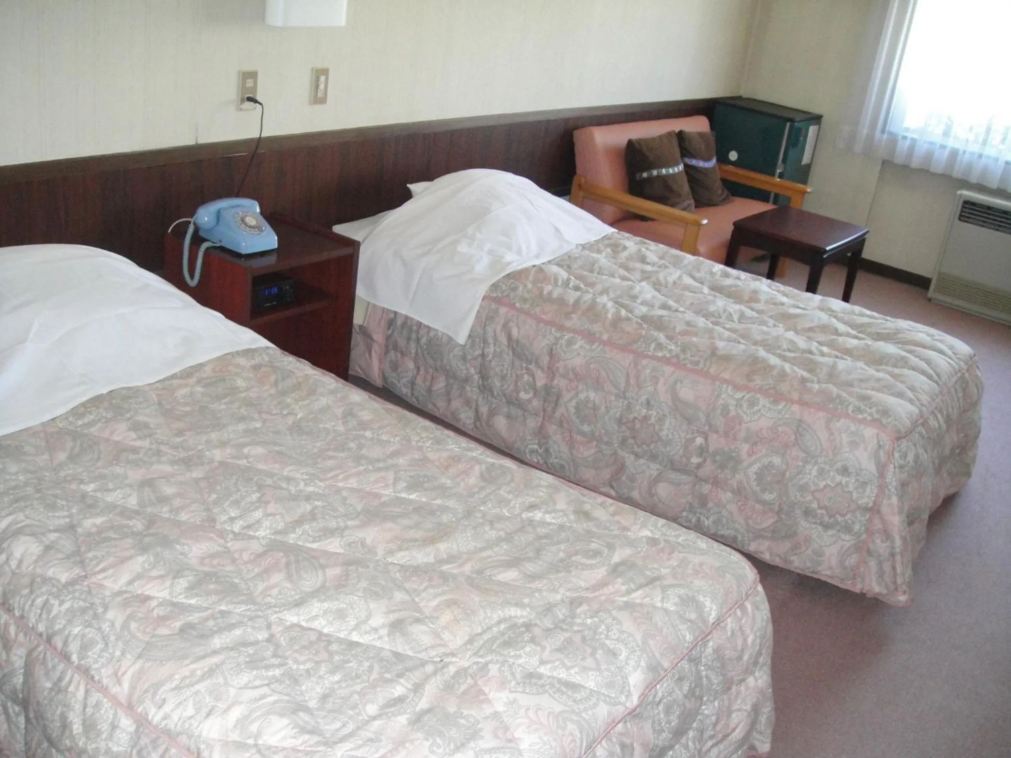 Bed in Hotel Weisser Hof Happei