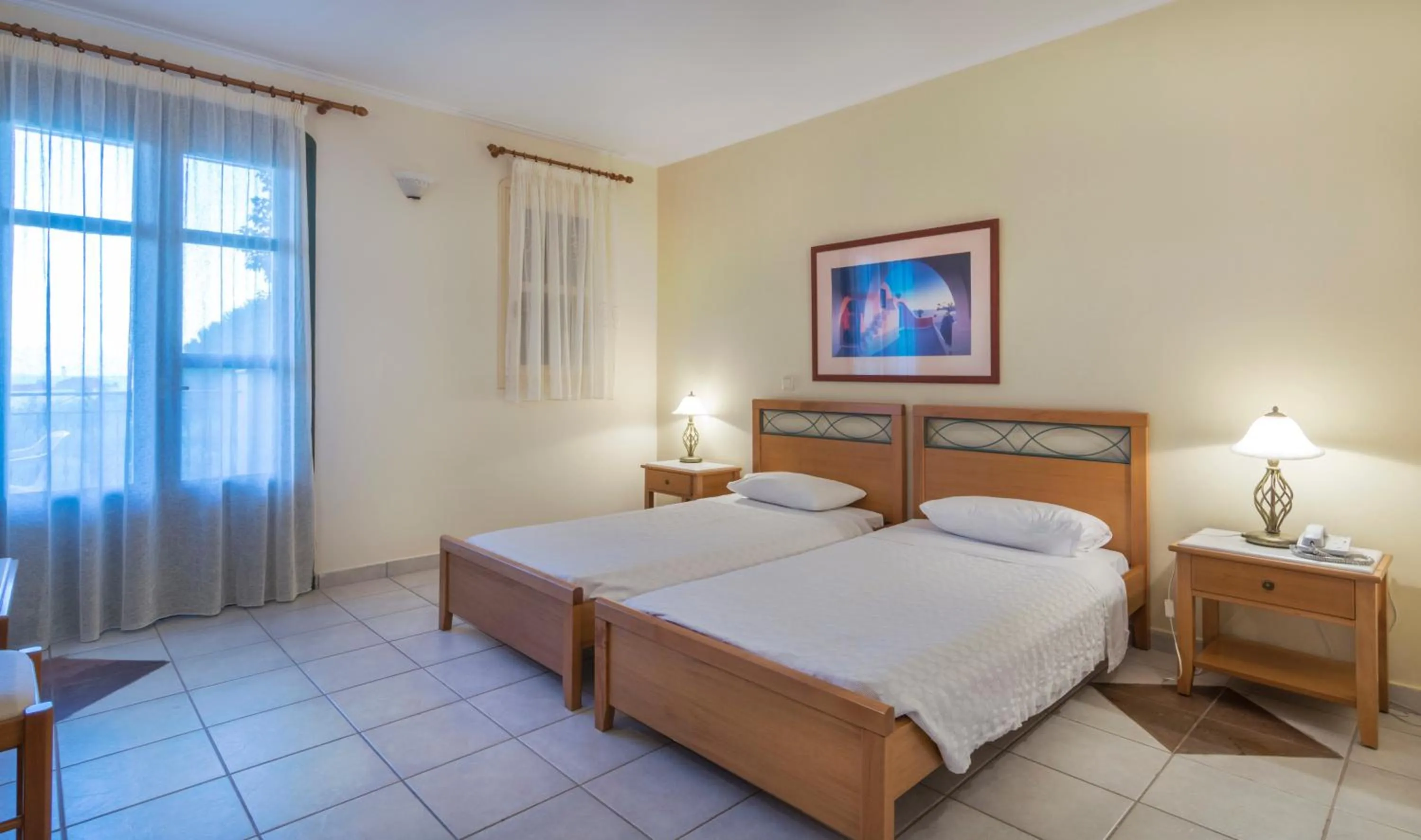 Bed in Kyveli Hotel Apartments