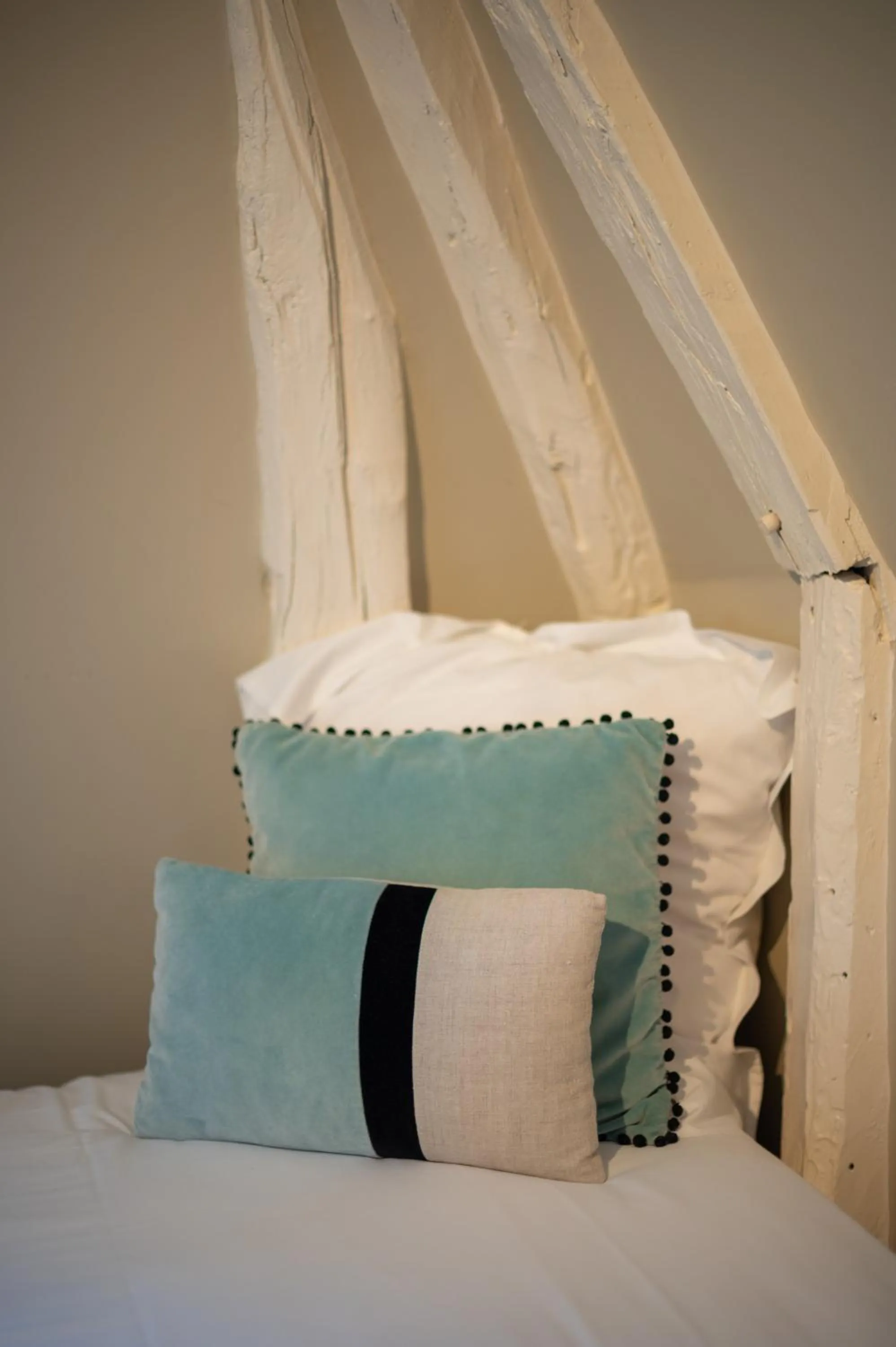 Decorative detail, Bed in Hôtel La Couleuvrine Sarlat Centre Ville