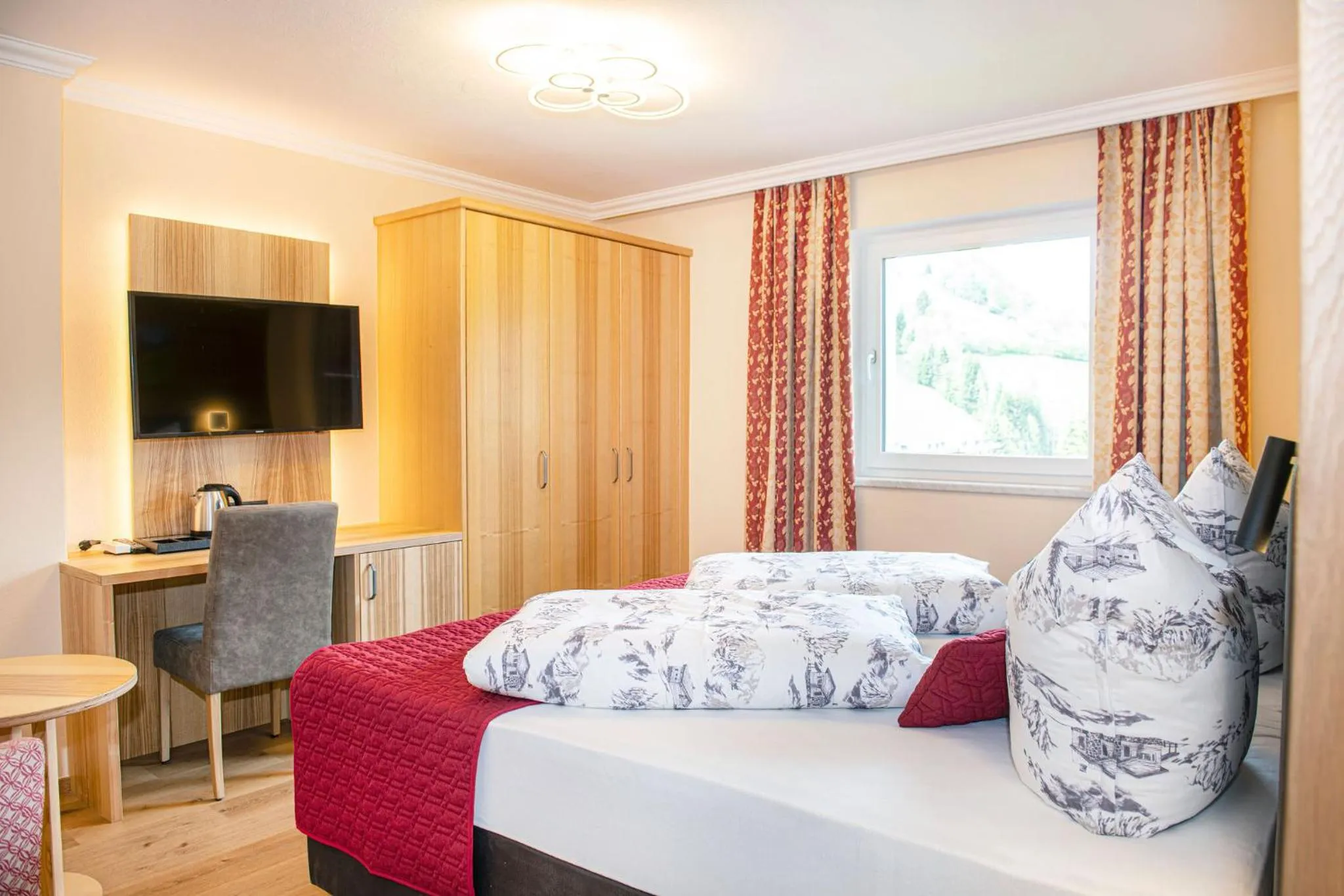 View (from property/room), Bed in Hotel Schneeberger