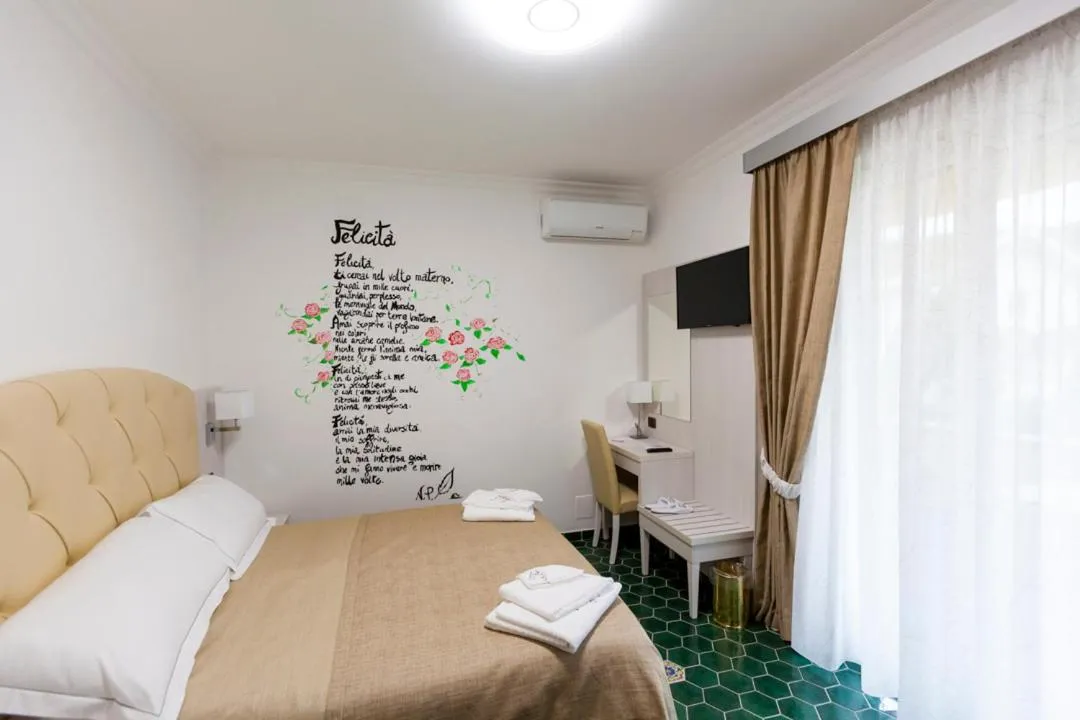 Photo of the whole room in Na' Poesia B&B di Charme