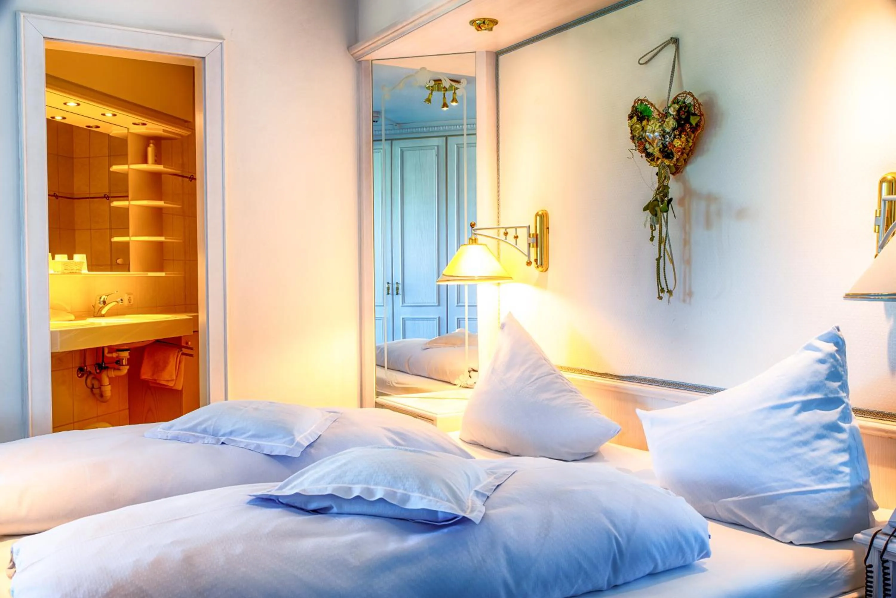 Bathroom, Bed in Hotel Almhof Rupp