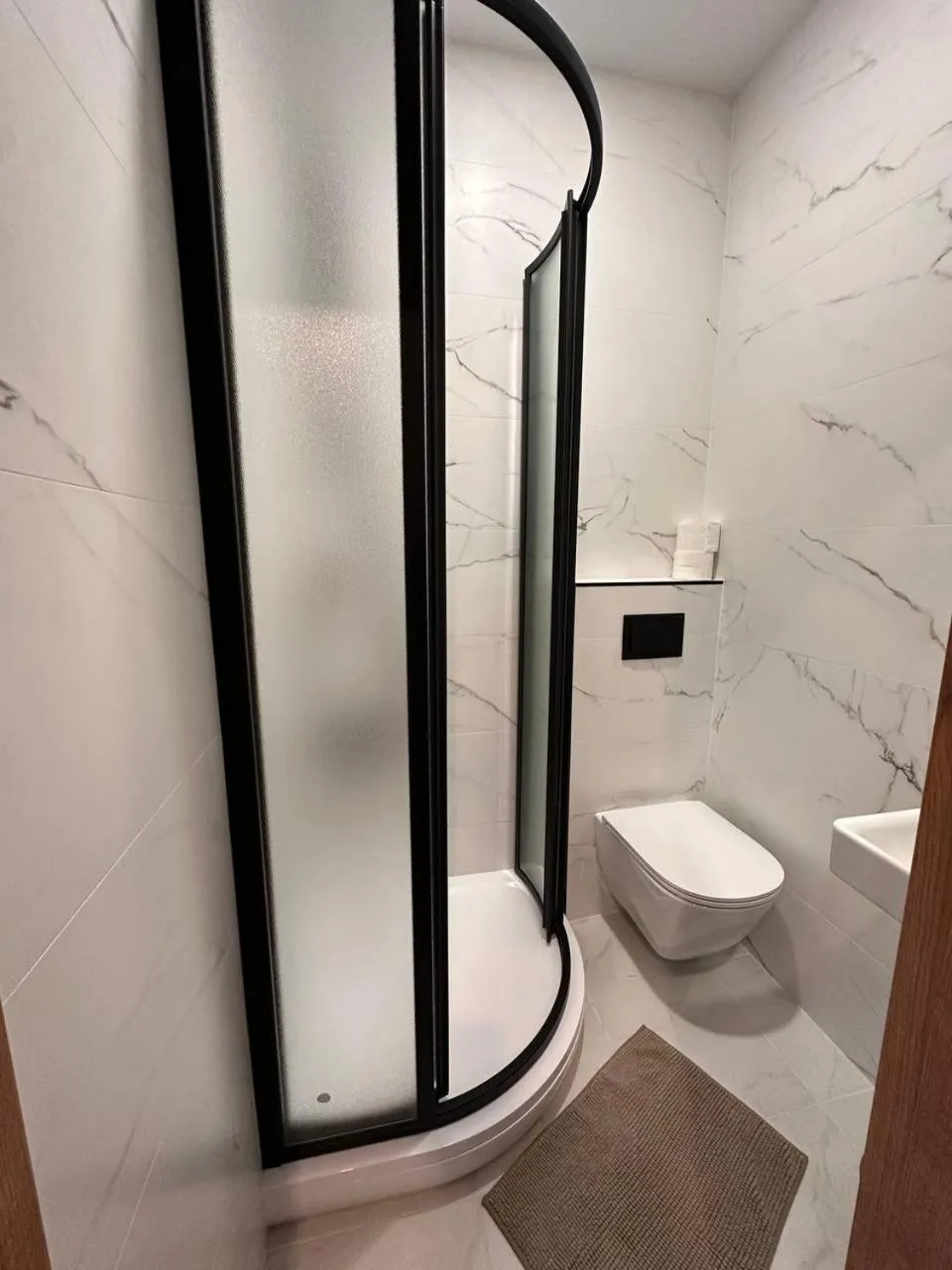 Shower in House of Sun