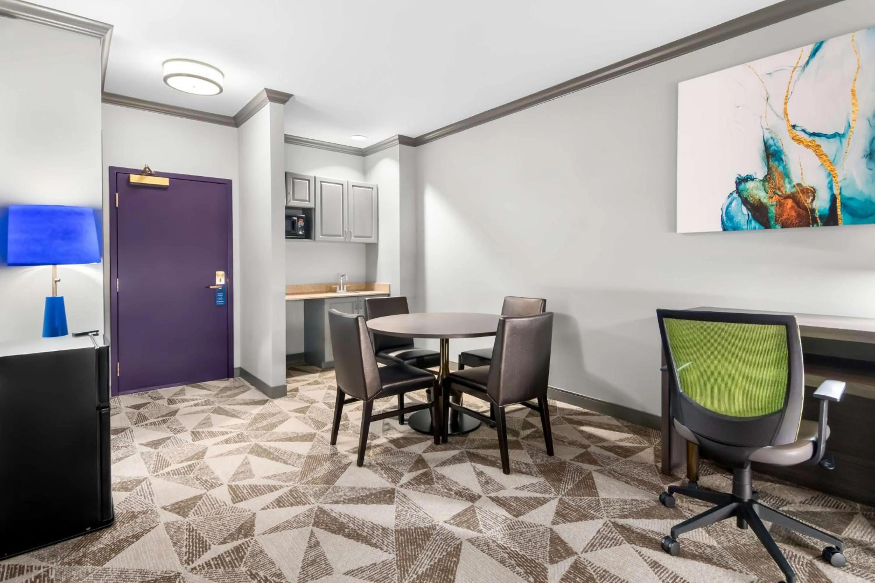 Bedroom in Big Country Hotel & Suites, SureStay Collection by BW