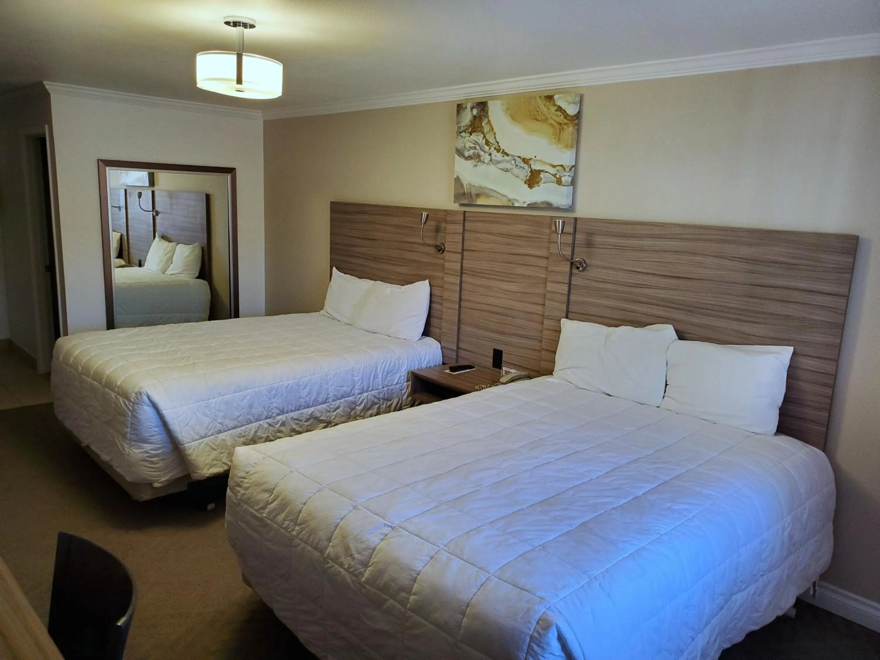 Bed in Exchange Club Motel