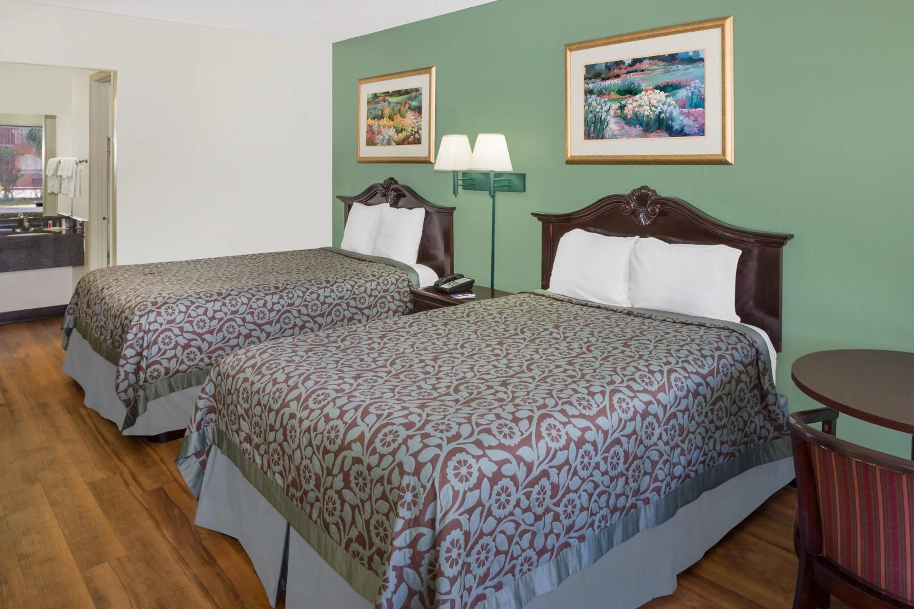 Bedroom, Bed in Travelodge by Wyndham Fort Myers North