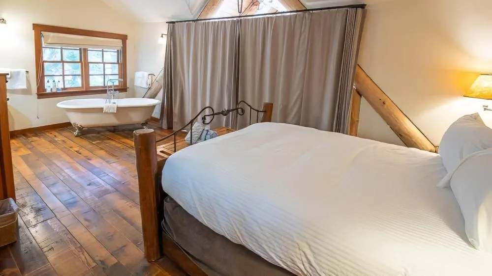 Bed in Snow Creek Cabins by Fernie Lodging Co