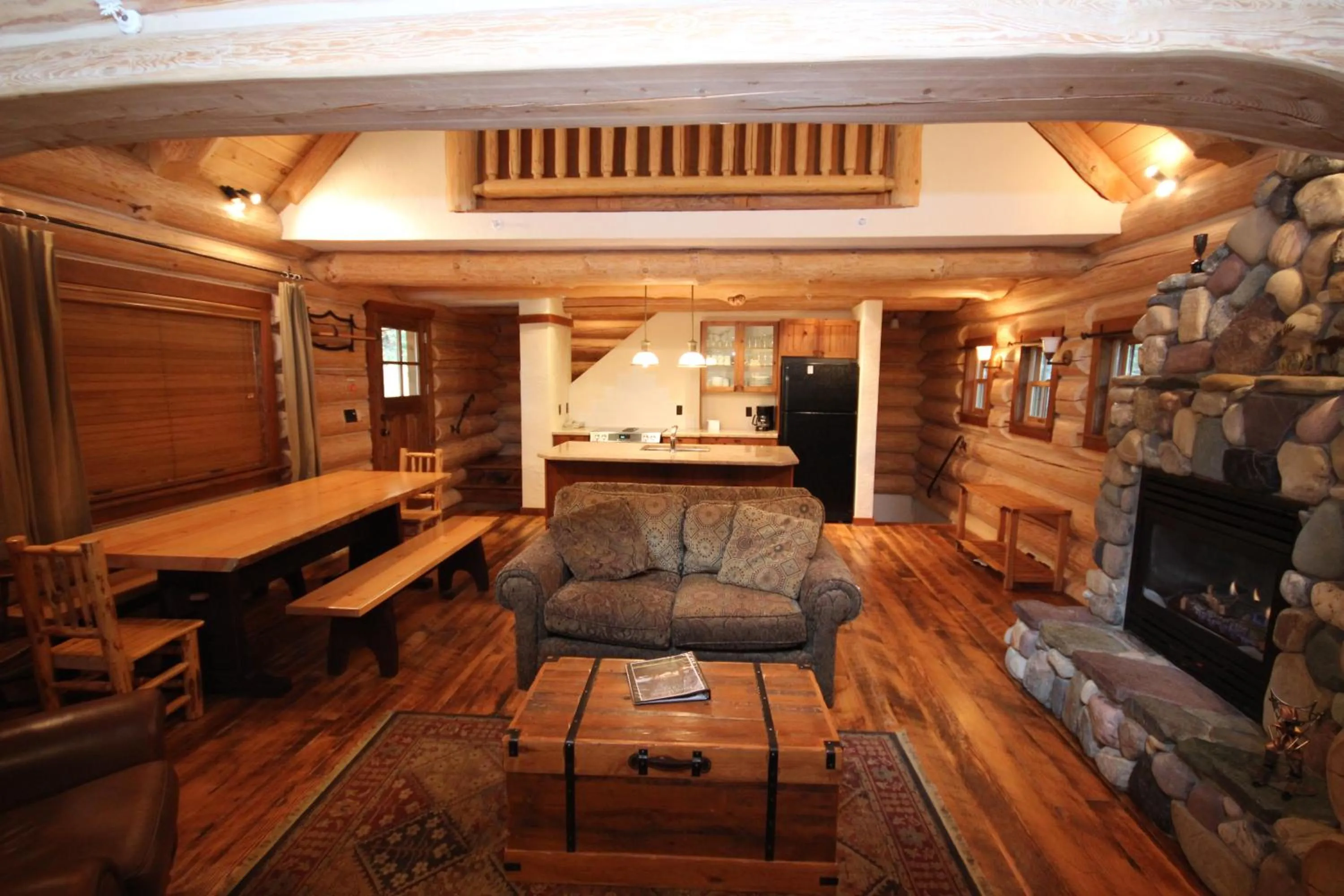 Living room in Snow Creek Cabins by Fernie Lodging Co