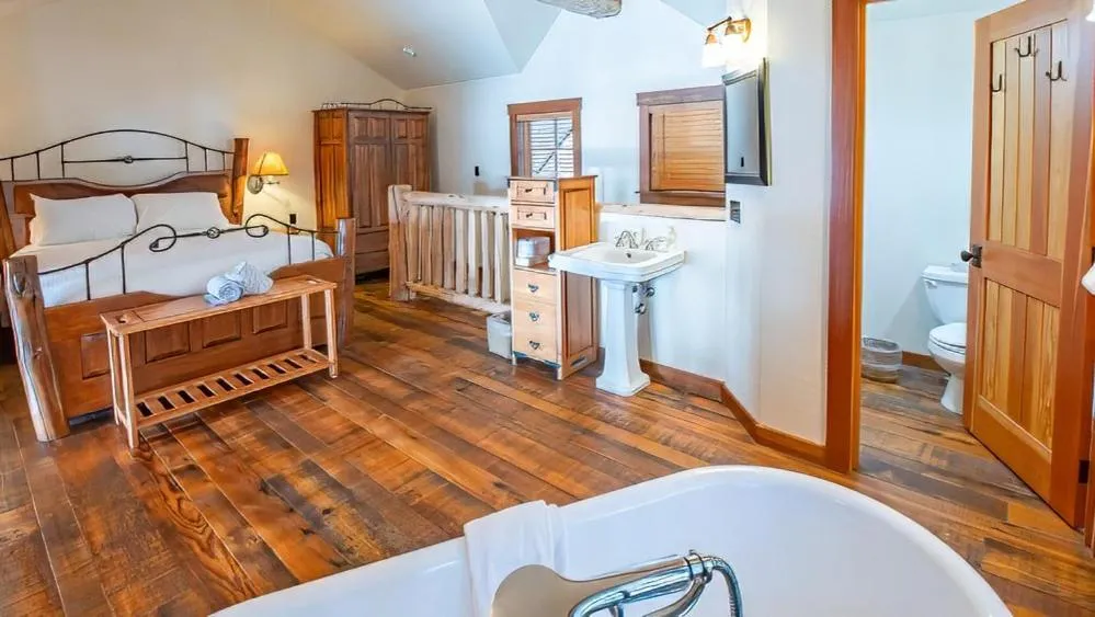 Bed in Snow Creek Cabins by Fernie Lodging Co