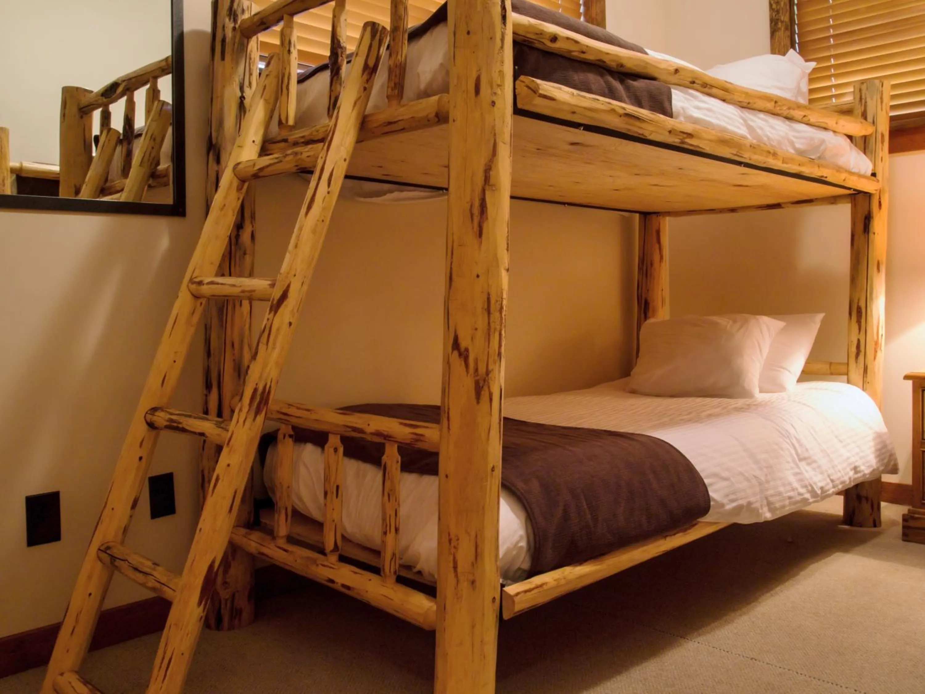 Bedroom, Bed in Snow Creek Cabins by Fernie Lodging Co