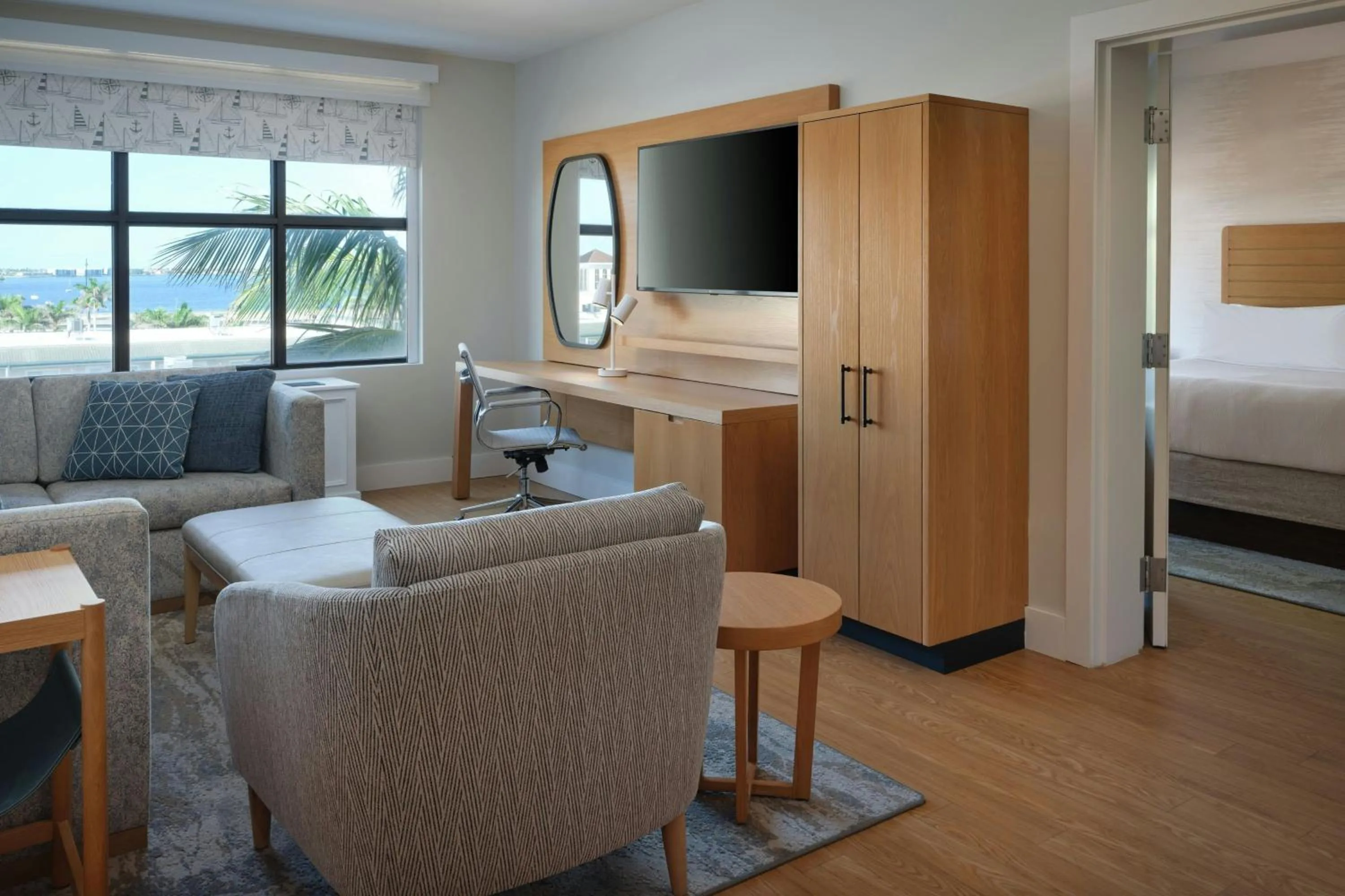 Living room, Bed in Four Points by Sheraton Punta Gorda Harborside