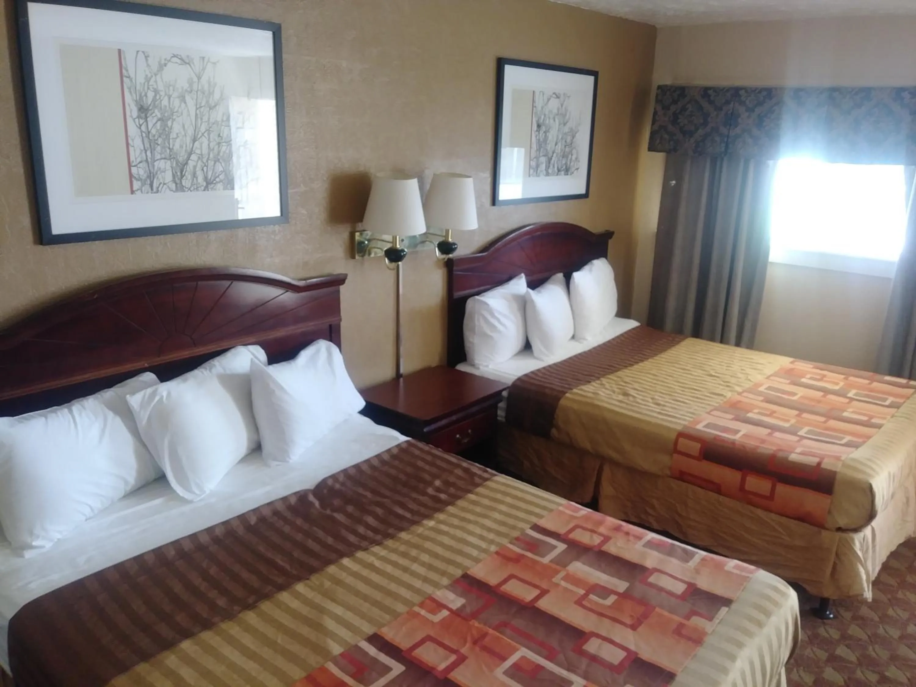 Bed in Garden Inn & Suites New Braunfels