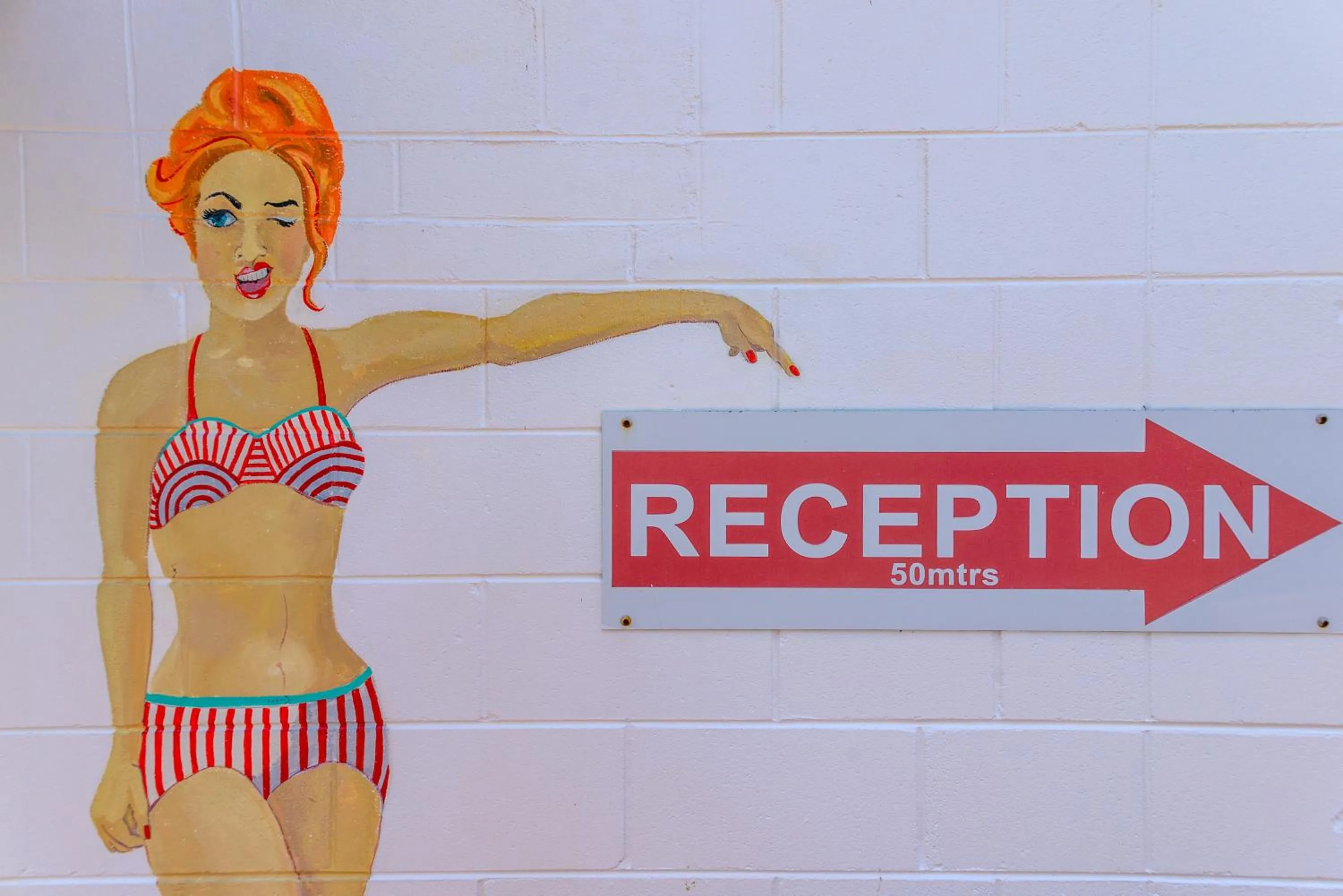 Property logo or sign in Port Douglas Motel