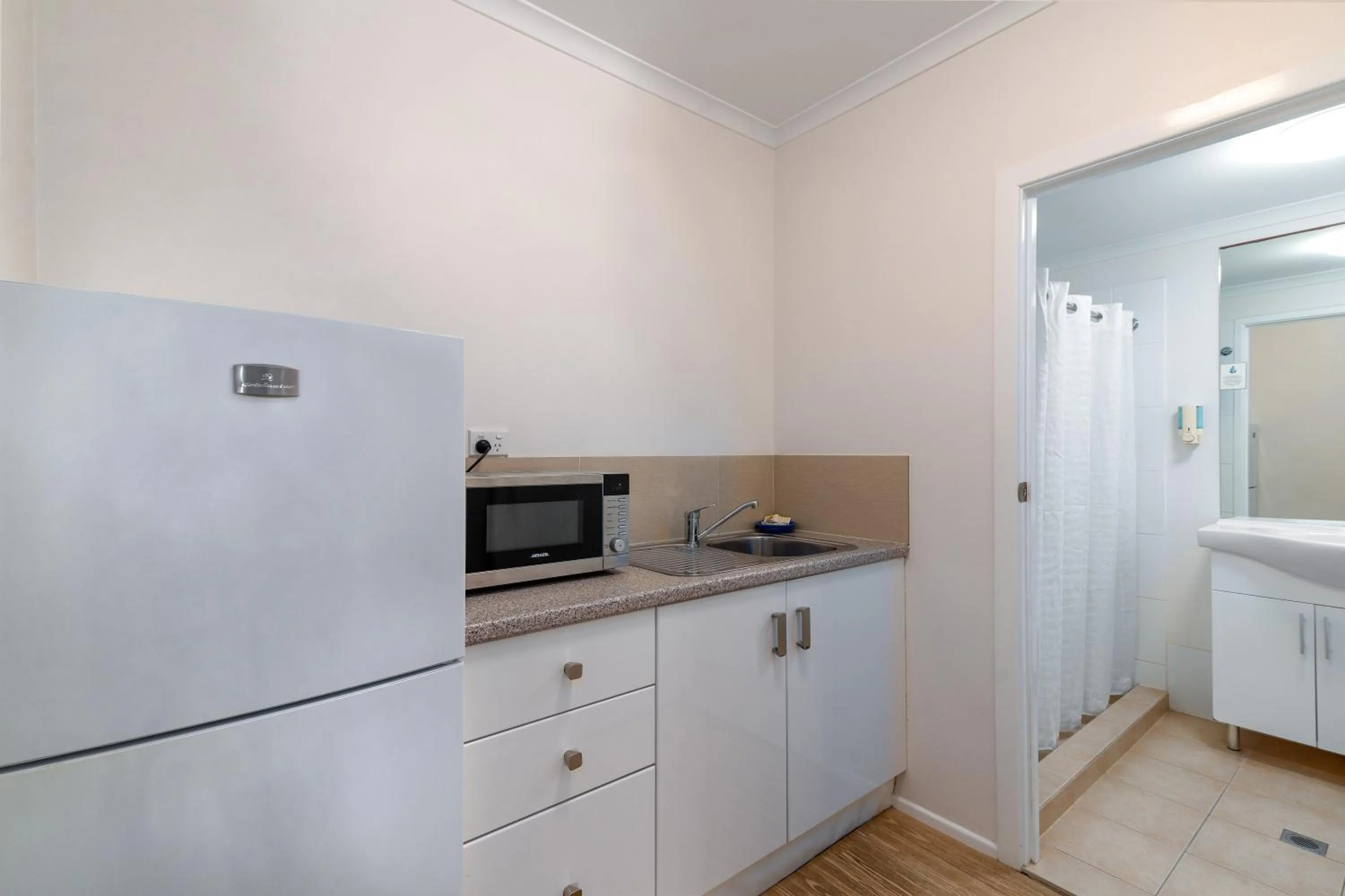 Kitchen or kitchenette in Port Douglas Motel