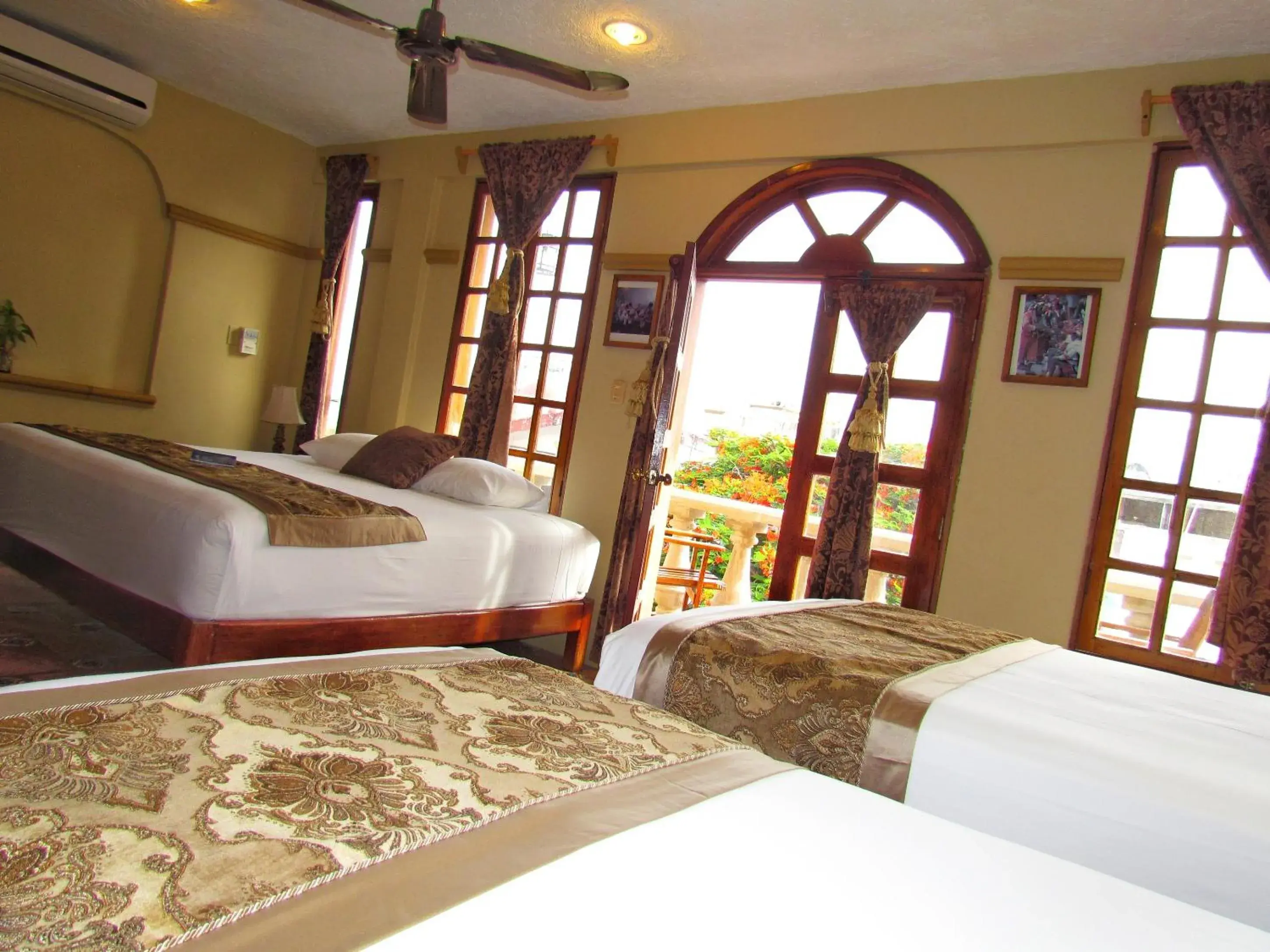 Family Room with Balcony in Hotel Cielo Family Room with Balcony in Hotel Cielo