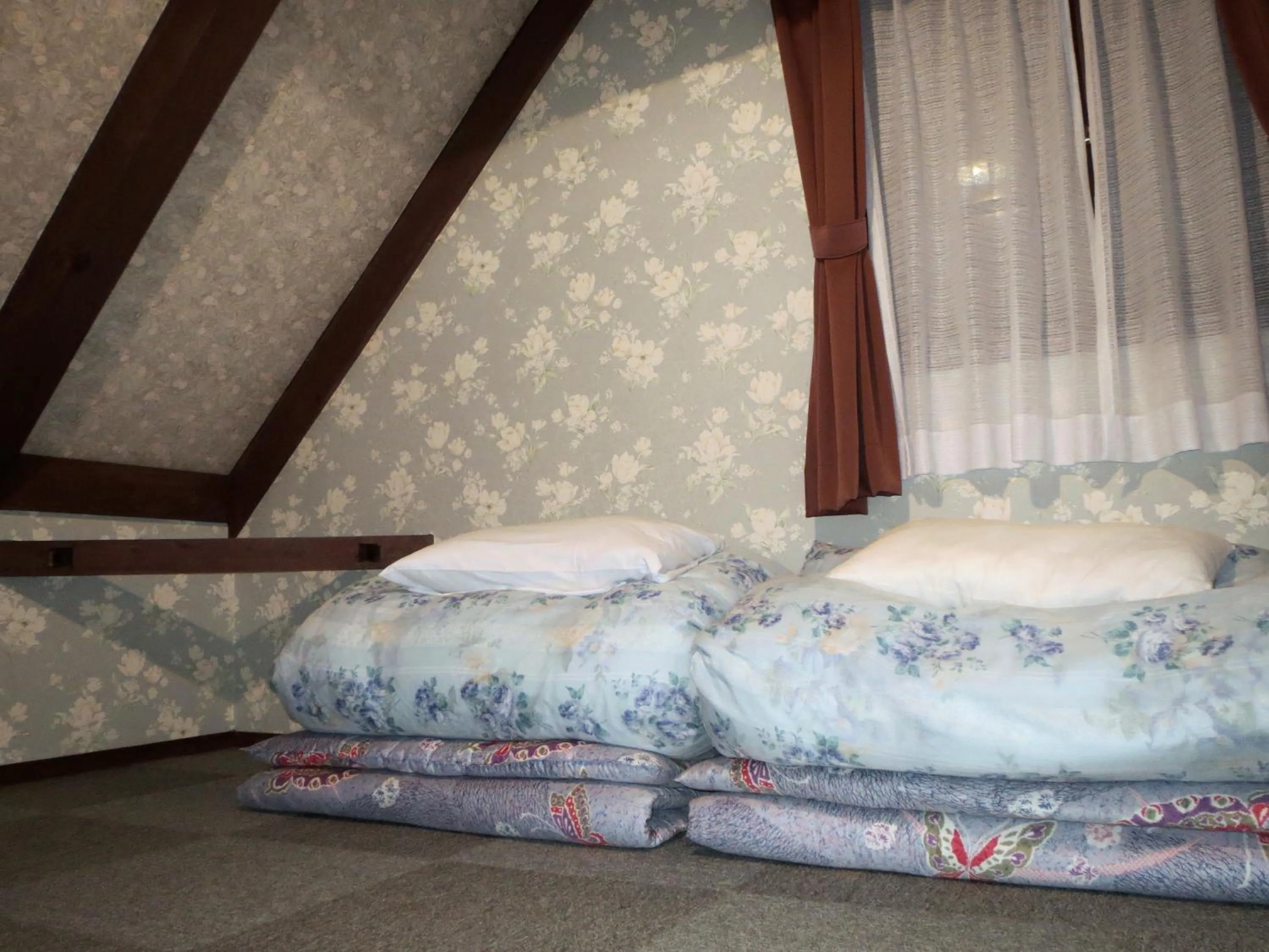 Photo of the whole room, Bed in Pension Marionette