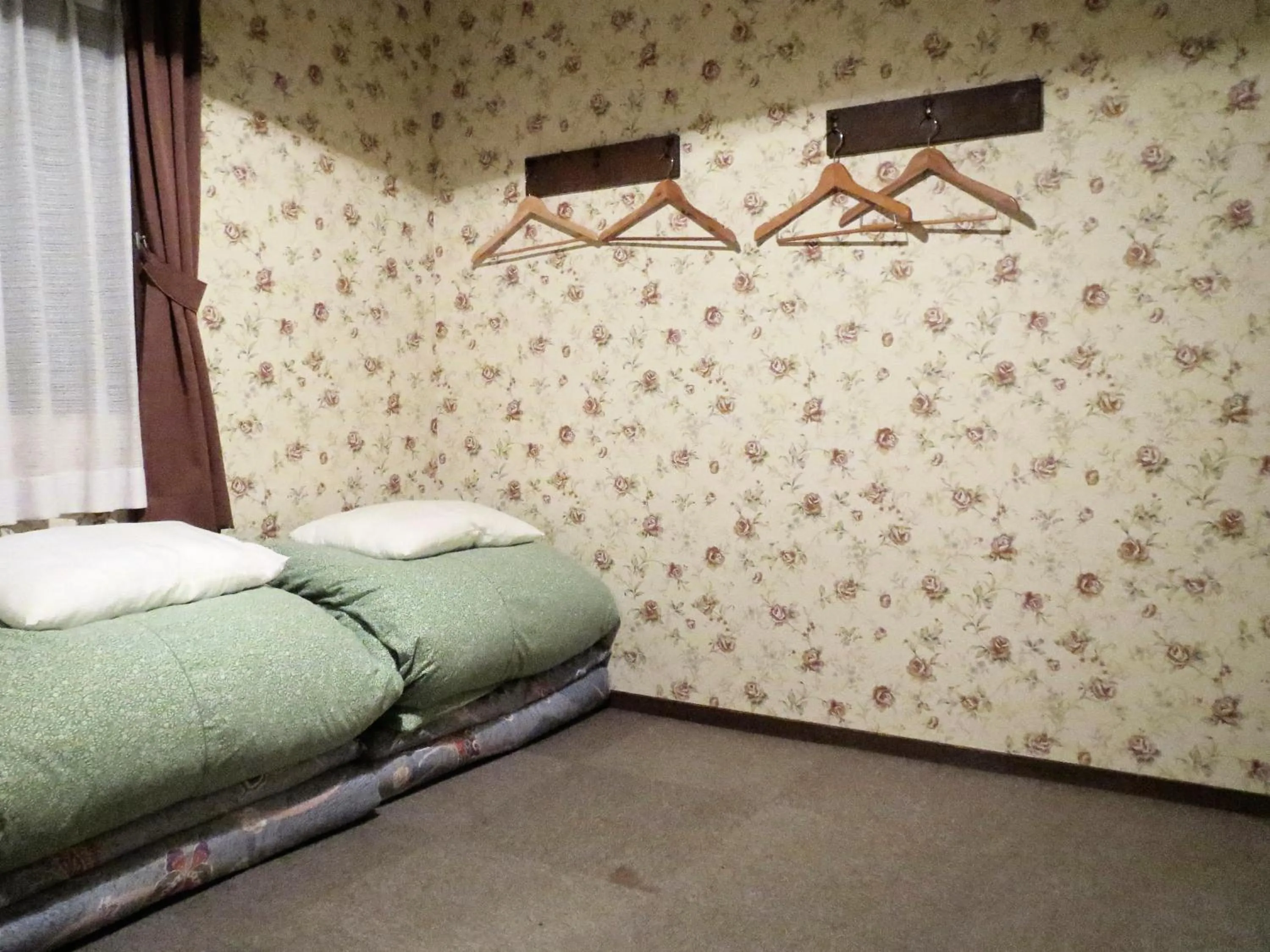 Photo of the whole room, Bed in Pension Marionette