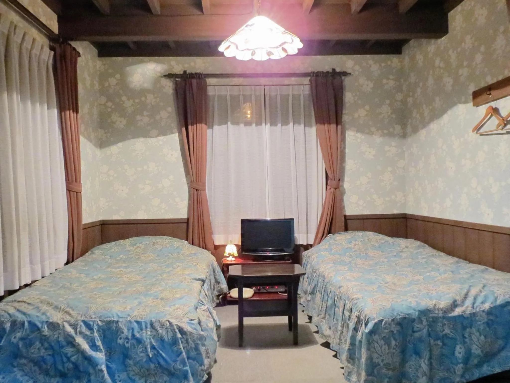 Photo of the whole room, Bed in Pension Marionette