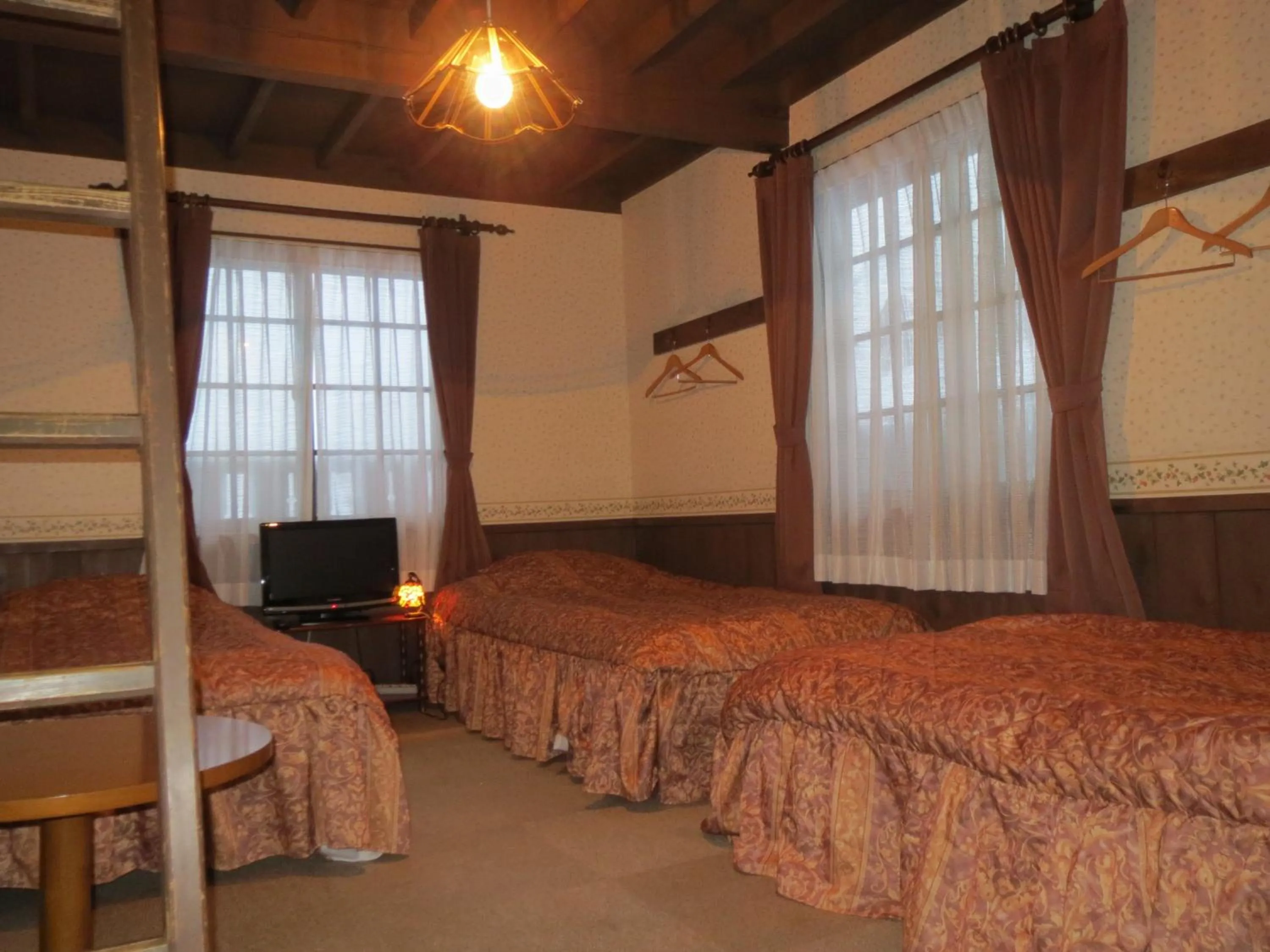 Photo of the whole room, Bed in Pension Marionette